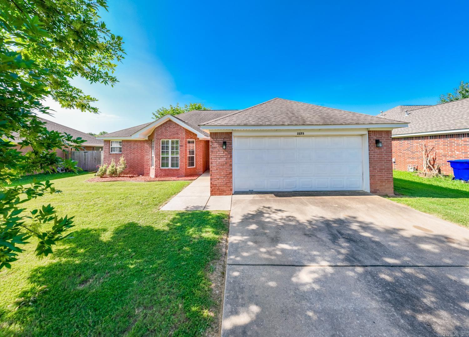 MOVE IN READY w/ CONWAY CORP UTILITIES! Welcome home to this well-maintained, all brick, one-level home with a host of updates! This professionally cleaned, spacious 1,553 sqft home offers 3 bedrooms, 2 bathrooms and sunroom with high ceiling. The desirable split floorplan provides privacy, while the sunroom, accessed by French doors off the living room, adds a bright and inviting additional space. The kitchen equipped with lots of cabinets & counterspace is open to the dining area with large bay window and tray ceiling adding a touch of elegance. The primary suite features double sinks, a jacuzzi tub, separate shower and two walk-in closets. The large fenced backyard is perfect for relaxing or entertaining guests. Updates include NEW HVAC, NEW water heater, NEW interior paint & trim, NEW ceramic tile floors, NEW light fixtures, NEW toilets, NEW ceiling fans, NEW doors, NEW microwave, NEW garbage disposal, NEW hard wired smoke detector, NEW landscaping and exterior has been freshly pressure washed. Kitchen refrigerator & mounted TV INCLUDED and new washer & dryer set negotiable. Conveniently located near great restaurants, shopping, schools. Won’t last long! Agents see remarks.