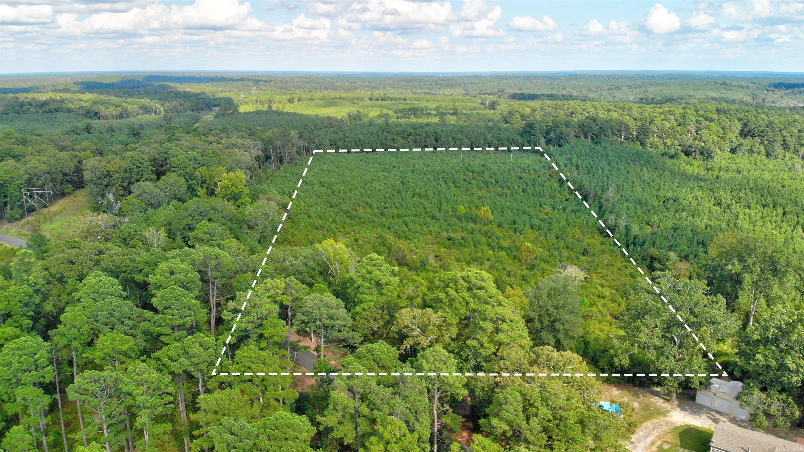 20 Acres on Country Road, all utilities are set up and property has a storm shelter.