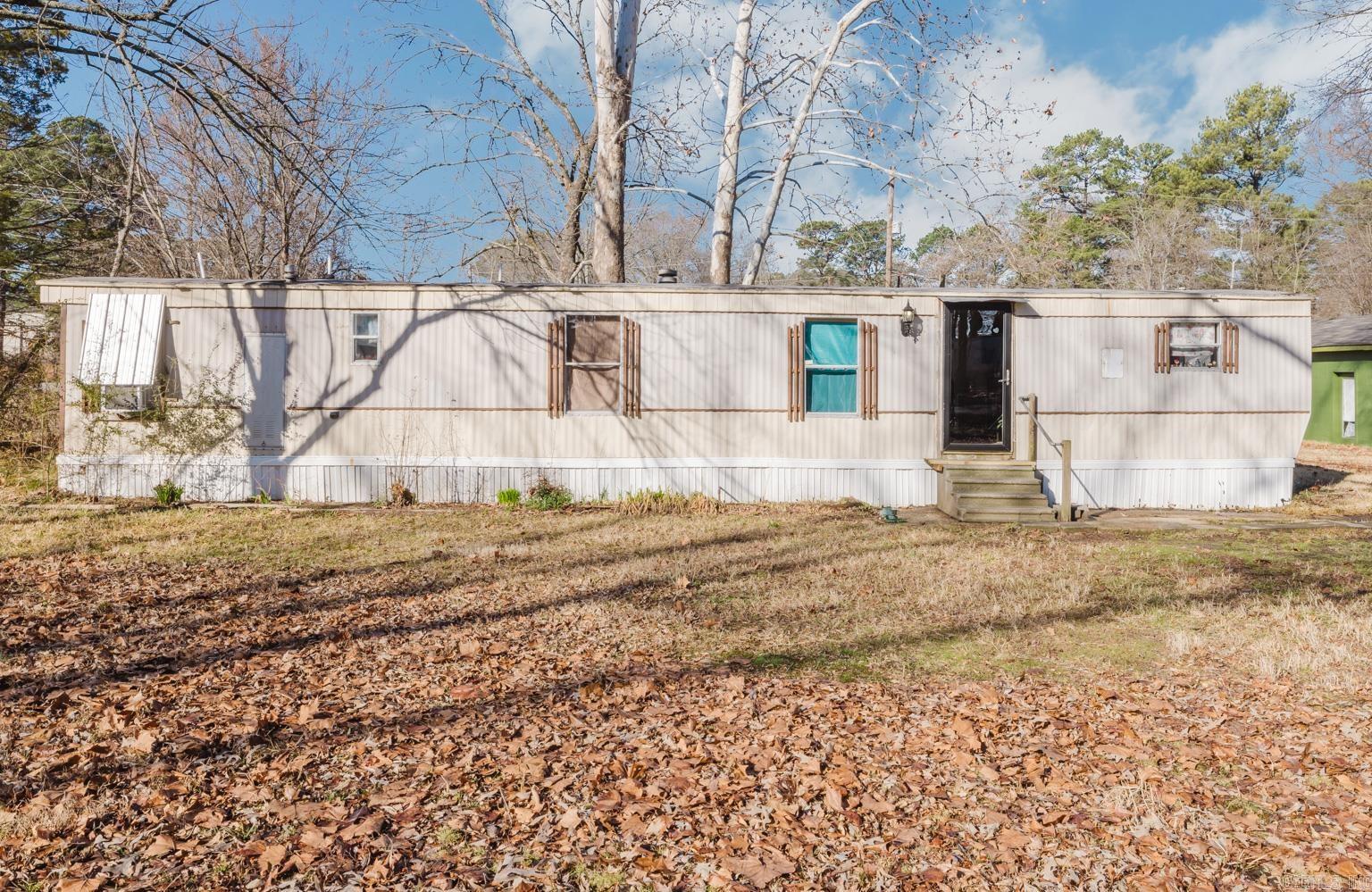 THIS HOME HAS HAD NEW FLOORING INSTALLED, BATH TUB INSERT, SHEET ROCK WALLS AND AN UPDATED CENTRAL HEAT. A 1200 SQUARE FOOT SHOP NEWLY PAINTED WITH ELECTRICITY AND A NEW ROOF.