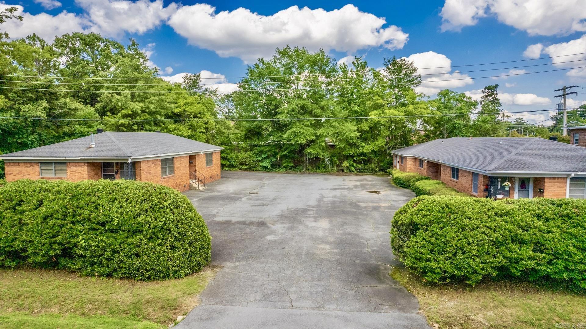This is a a Triplex and Duplex on the same property saying the same parking lot just steps away from Midtown living. The Triplex consists of 2 bedroom, 1 bathroom units. The Duplex consists of 1 bedroom, 1 bathroom units. We are excited for you to consider this amazing investment opportunity. Please allow 48 hours notice for showings. The property is currently being rented short term and we will have to make sure we send you to the correct vacant units.