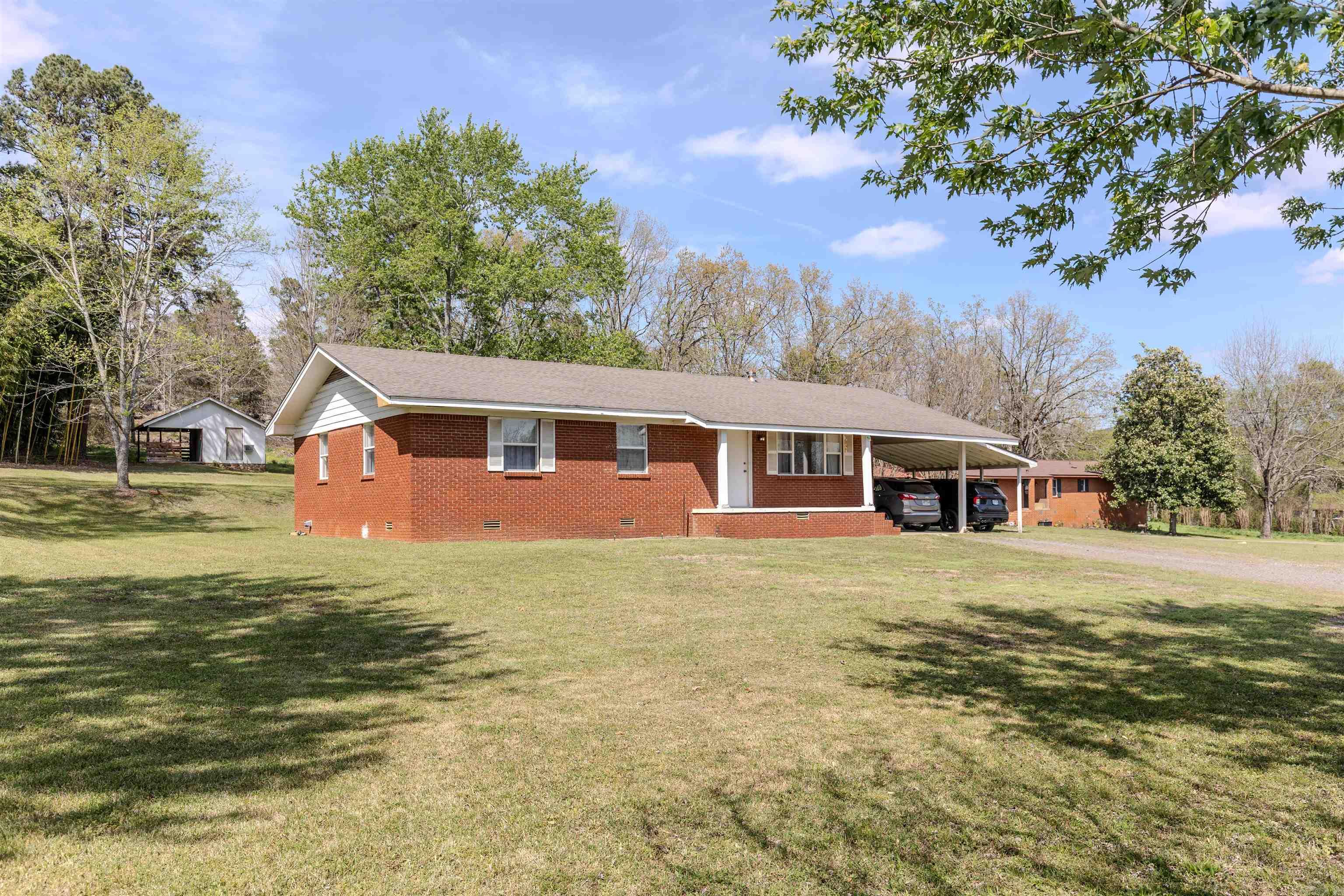 This country home is move-in ready and located on 4 beautiful, unrestricted acres! This home features 3 bedrooms and 2 bathrooms, with updated interior paint, flooring and countertops. The acreage features a creek that runs through the back of the property and has signs of wildlife throughout the hardwoods. The property backs up to thousands of acres of Potlatch Deltic land. Also, you are just a short drive over to Nimrod Lake, the oldest Corps of Engineers lake in the state! Cradled between the Ouachita and Ozark Mountains, Nimrod Lake is popular with fishermen and hunters alike. There is a well drilled on the property. Fiber internet is available here as well! This home qualifies for USDA Rural Development loan with a 0% down payment option!