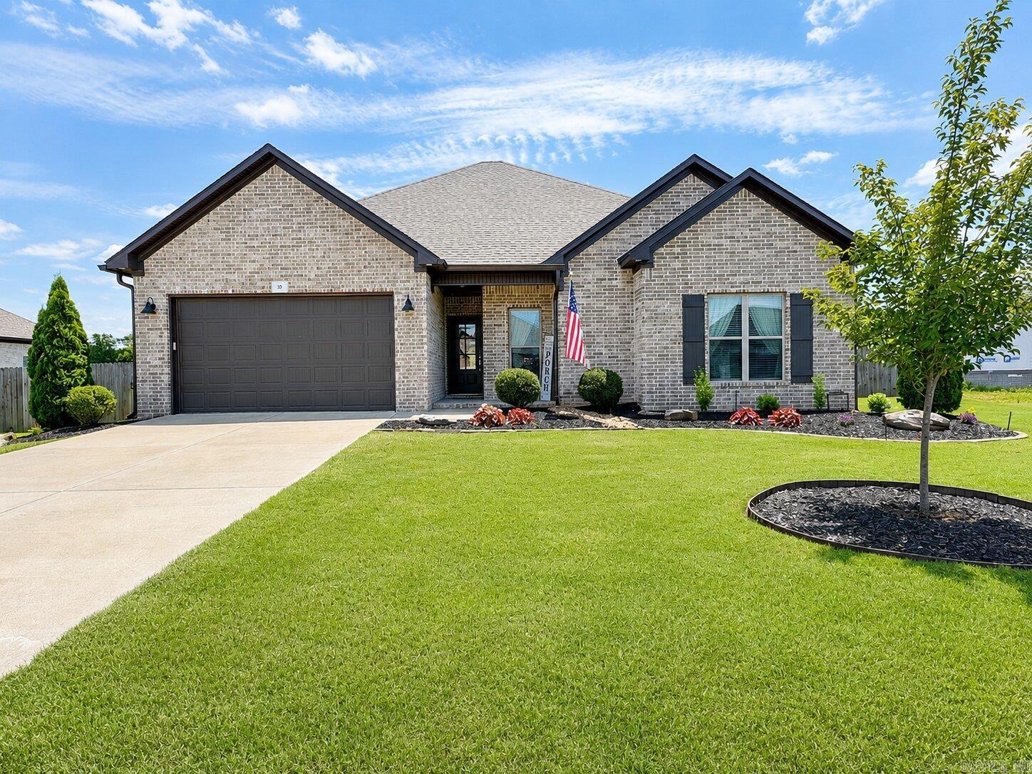 Welcome home to this beautifully maintained, Better than New, 4-bedroom, 2-bath residence located in a quiet subdivision near highly sought-after Greenbrier Schools. Designed w/today’s modern lifestyle in mind, this open-concept floor plan features crisp white shaker-style cabinetry, granite countertops, stainless steel appliances, & a huge center island to anchor the spacious kitchen & living areas. Private primary suite offers a true retreat w/a jetted tub, tiled walk-in shower, double vanity, & dual walk-in closets. Three guest bedrooms seperate from the master suite for added privacy. Sellers have invested over $35,000 in upgrades and improvements, including professional landscaping, irrigation systems in both the front and back yards, custom blinds & draperies, & an extended patio complete w/a pergola. Fully privacy-fenced backyard, exceptional outdoor living space, & a 2-car garage. With beautiful curb appeal, and move-in-ready condition, this home offers the perfect blend of comfort, style, & functionality.