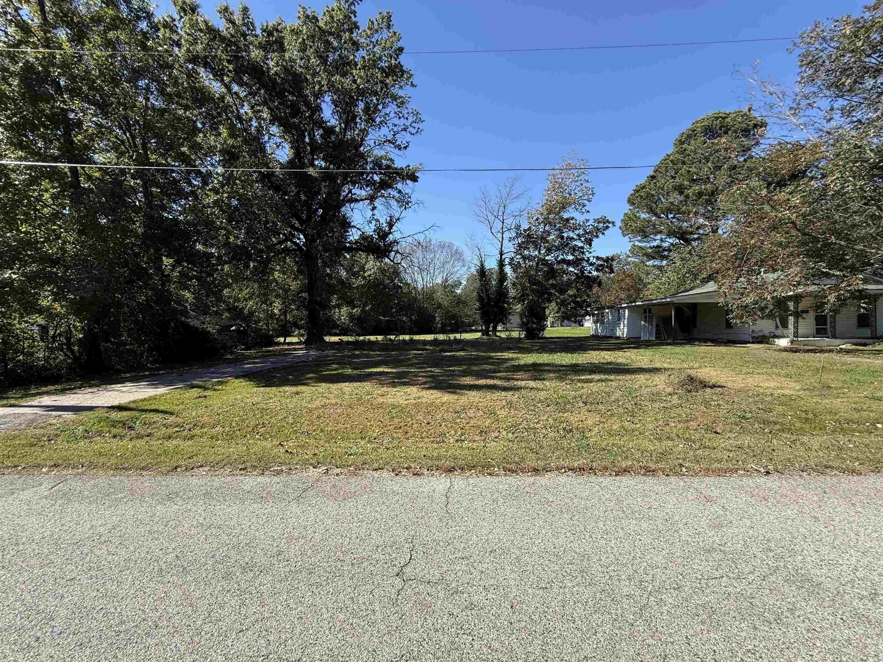 375 S. 10th Ave in Piggott, AR presents a 0.34-acre lot with excellent potential and a convenient in-town location. Situated in an established neighborhood with nearby access to city utilities, this property offers a solid opportunity for future appreciation or portfolio expansion. With its manageable size and great proximity to local amenities, this lot is a smart addition for any investor.