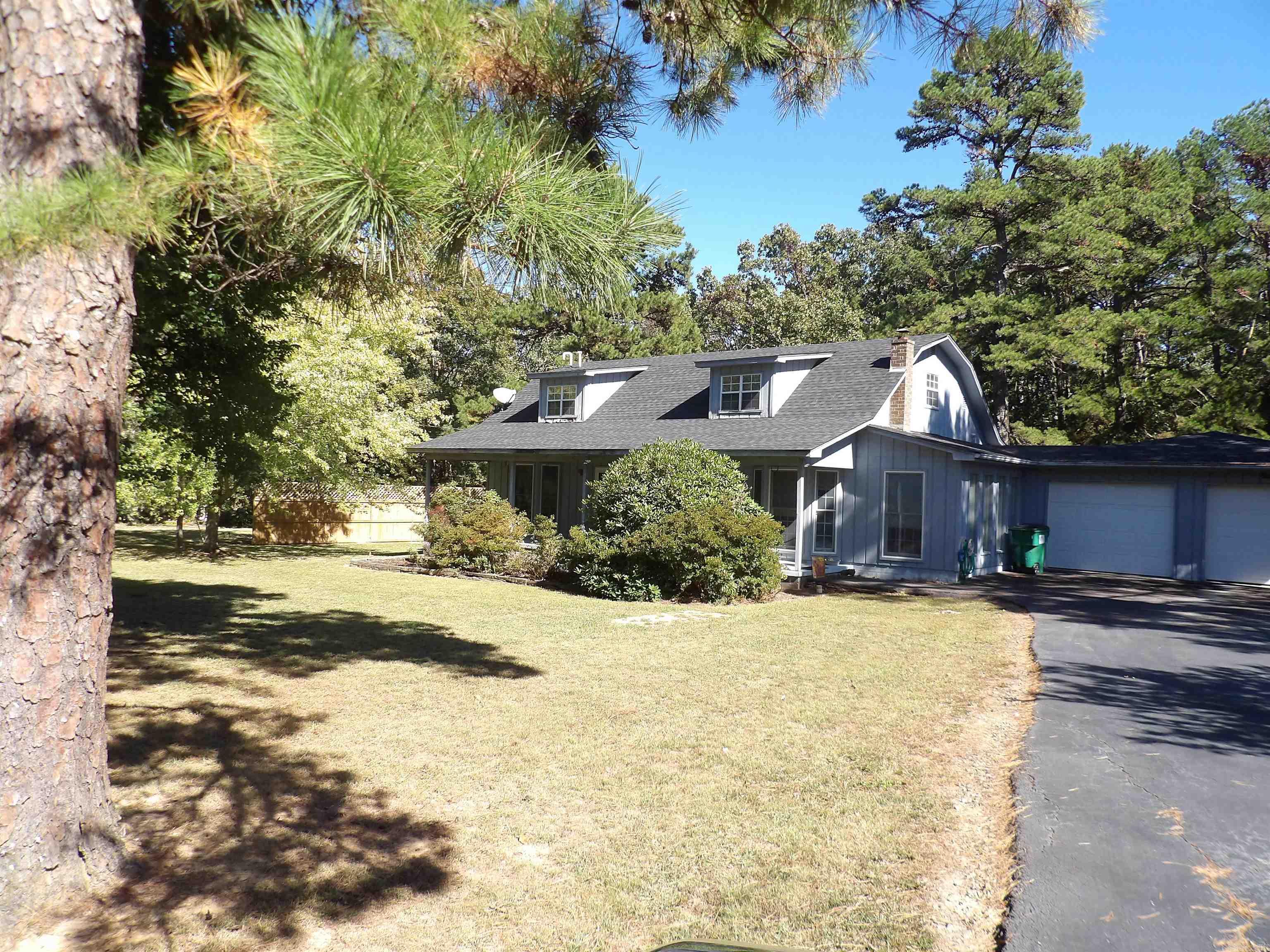 WONDERFUL STREET APPEAL!! THIS UNIQUE HOME FEATURES 2,348' OF LIVING AREA. MASTER BEDROOM IS LOCATED MAIN LEVEL AND SECOND BEDROOM IS UPSTAIRS. LOTS OF STORAGE AREAS, DOUBLE GARAGE WITH AUTOMATIC DOORS. MANY OTHER AMENITIES!!