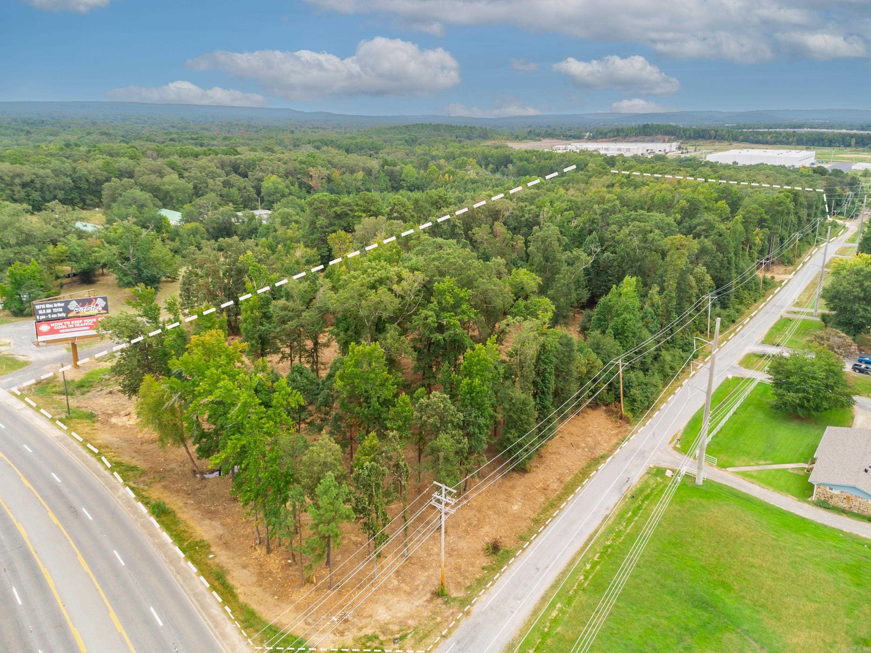 Considering Moving Your Business To A Higher Traffic Location? Look no further. Ready To Start A New Business? Here You Go! I-40 Exit 142 Maumelle/Morgan Area. Commercial Land To Be Sold Divided in Lots or Sold Whole. 8 Buildable Acres. 8 Lots Total. Prices Vary. Frontage, Middle and Back Lots Available. Utilities Available Are Entergy Electricity, Summit Gas, Central Arkansas Water, North Little Rock Wastewater and Internet. Located Outside City Limits of Maumelle. Pulaski County. One day this area will be annexed with the City of Maumelle. Land has been partially cleared and is easy to access for viewing. Comes with multiple ingress and egress. Using Hwy 365 and Tanning Rd. Existing Survey Available. Agents See MLS 25043130 Listing Full Parcel For Sale Commercial Acreage.