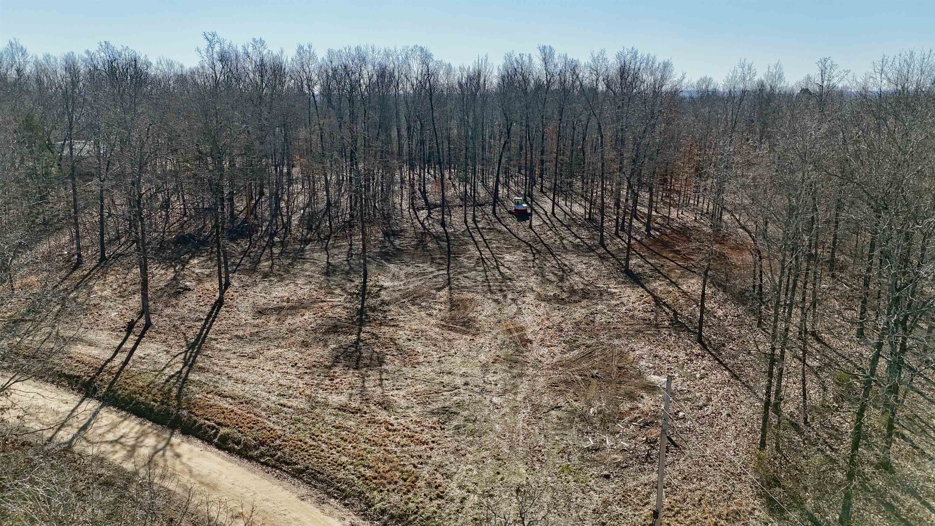 Discover the perfect blend of privacy and convenience with this beautiful 3.5 acre lot just outside of Melbourne! Located in a quiet subdivision, this property offers a peaceful, semi secluded setting while still being just a short drive to town. The lot has already been cleaned and cleared, making it ready for your new home build or mobile home setup. Utilities are in place with water, electricity, and fiber internet access available.  Enjoy the space to spread out, start a garden, add a shop, or simply relax and take in the natural surroundings. Though tucked away for privacy, you’re still conveniently close to Melbourne schools, local shops, restaurants, and everyday amenities. If you’ve been looking for acreage that’s build-ready with utilities available and the best of both country living and town convenience, this property is a must-see! OWNER FININACING AVALIABLE.