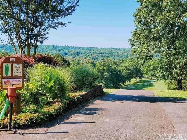Beautiful ±0.45-acre wooded lot offering the perfect balance of privacy and buildability. Lightly wooded with mature trees, this property provides an ideal setting for a custom home, cabin, or short-term rental retreat. Conveniently located near Lake Catherine and just a short drive to Hot Springs, you’ll enjoy quick access to boating, dining, shopping, and year-round tourism attractions. The area supports strong demand for vacation rentals, making this an excellent opportunity for investors or buyers looking to build an income-producing getaway. A great combination of location, usability, and investment potential.