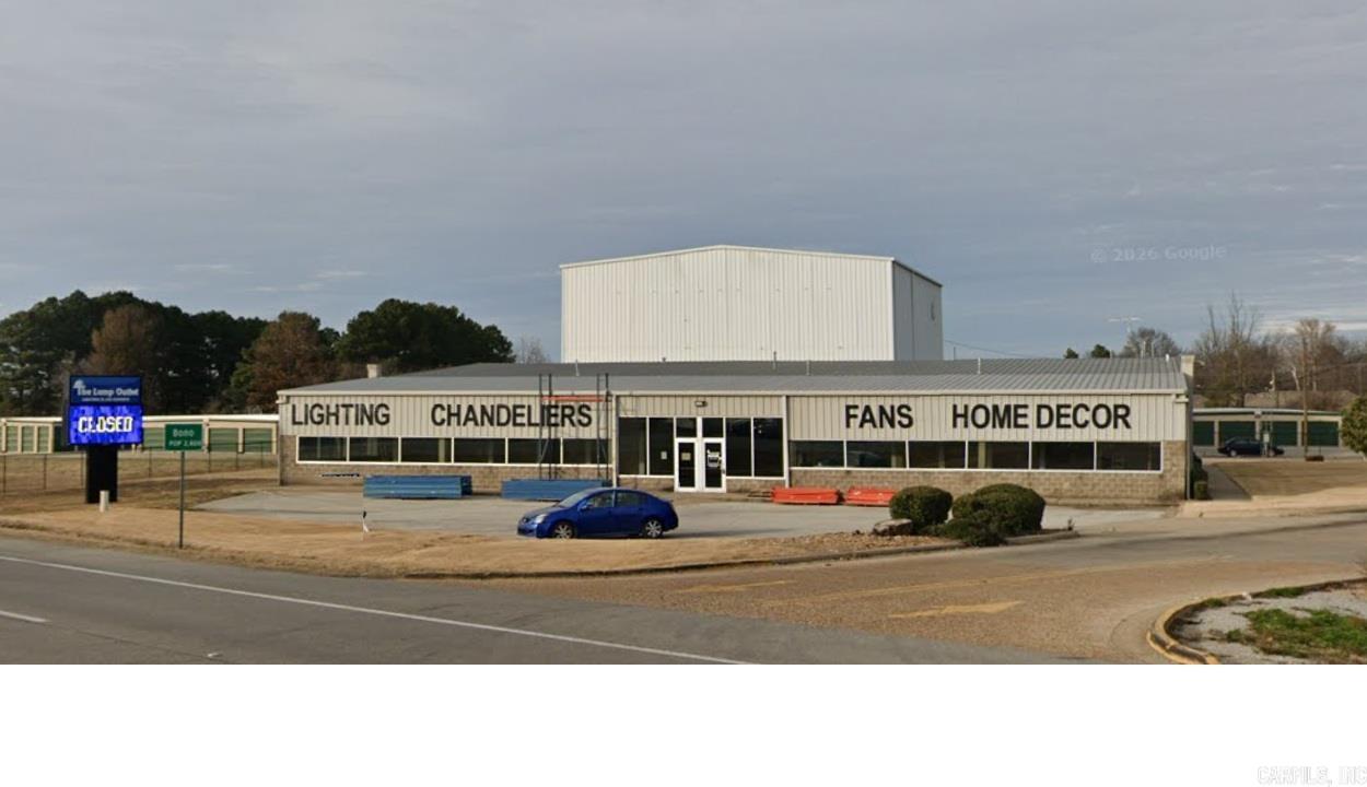 Remarkable Retail Presence for most any retail use including furniture, grocery, home furnishings, etc. Located along the heavily traveled Hwy 63 from Jonesboro to Walnut Ridge, Pocahontas, and Mountain Home, AR. Formerly The Lamp Outlet, this building has everything you need for your retail or distribution business. 100% heated and Cooled floor space and rack space storage. Located next door to a high traffic business which has a constant flow of patrons.  This 20,000 sq ft building has offices, retail floor space, displays throughout and office space, up and down. Distributors may find this property ideal as it has three dock-high doors, grade level doors, and three-phase power.