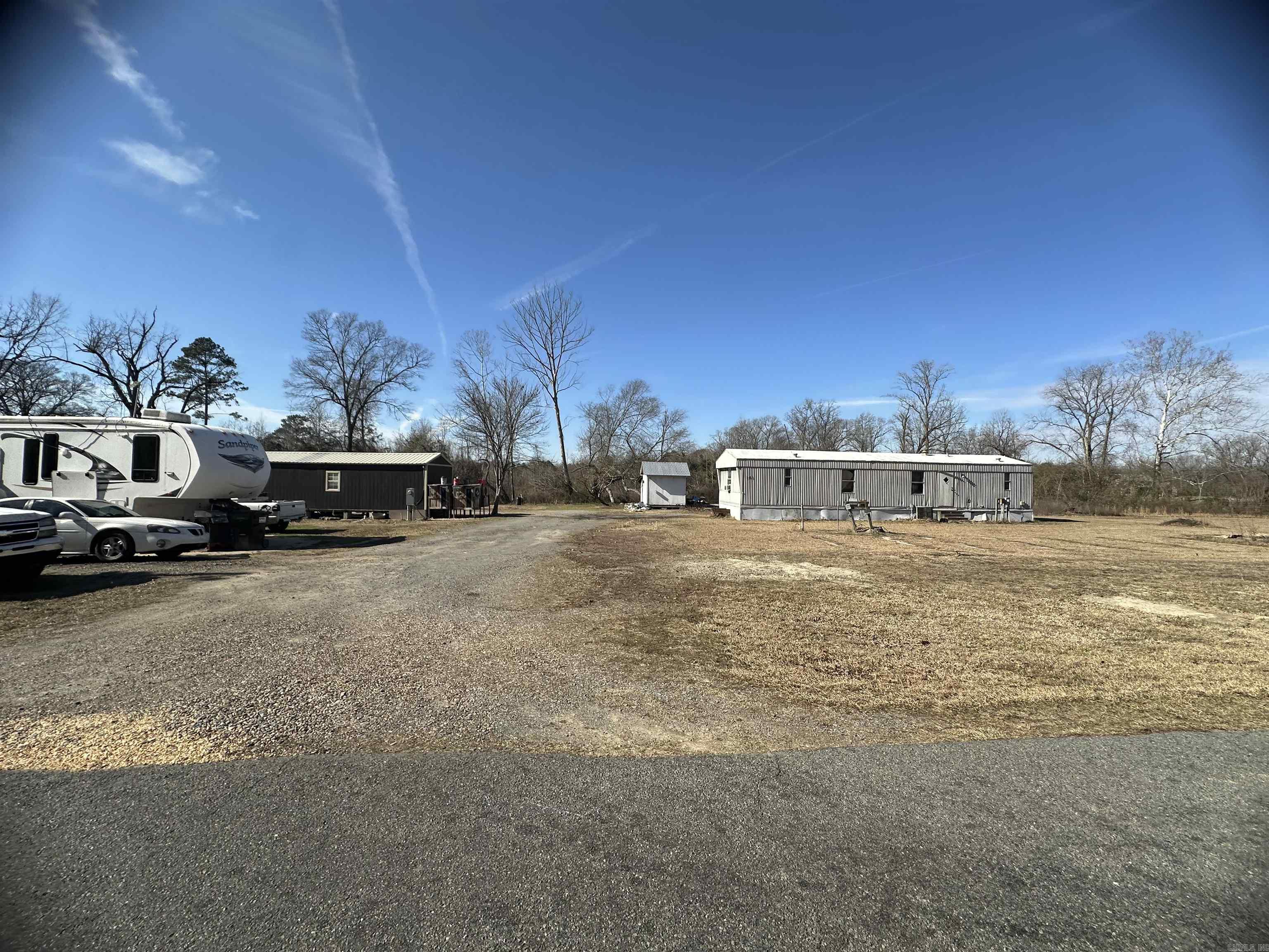 Great investment opportunity featuring 8 individual water meters and a master septic system. Property includes two additional home sites at the rear, offering future development potential. Currently, 5 sites are rented on short-term leases, providing immediate income with flexibility for repositioning.