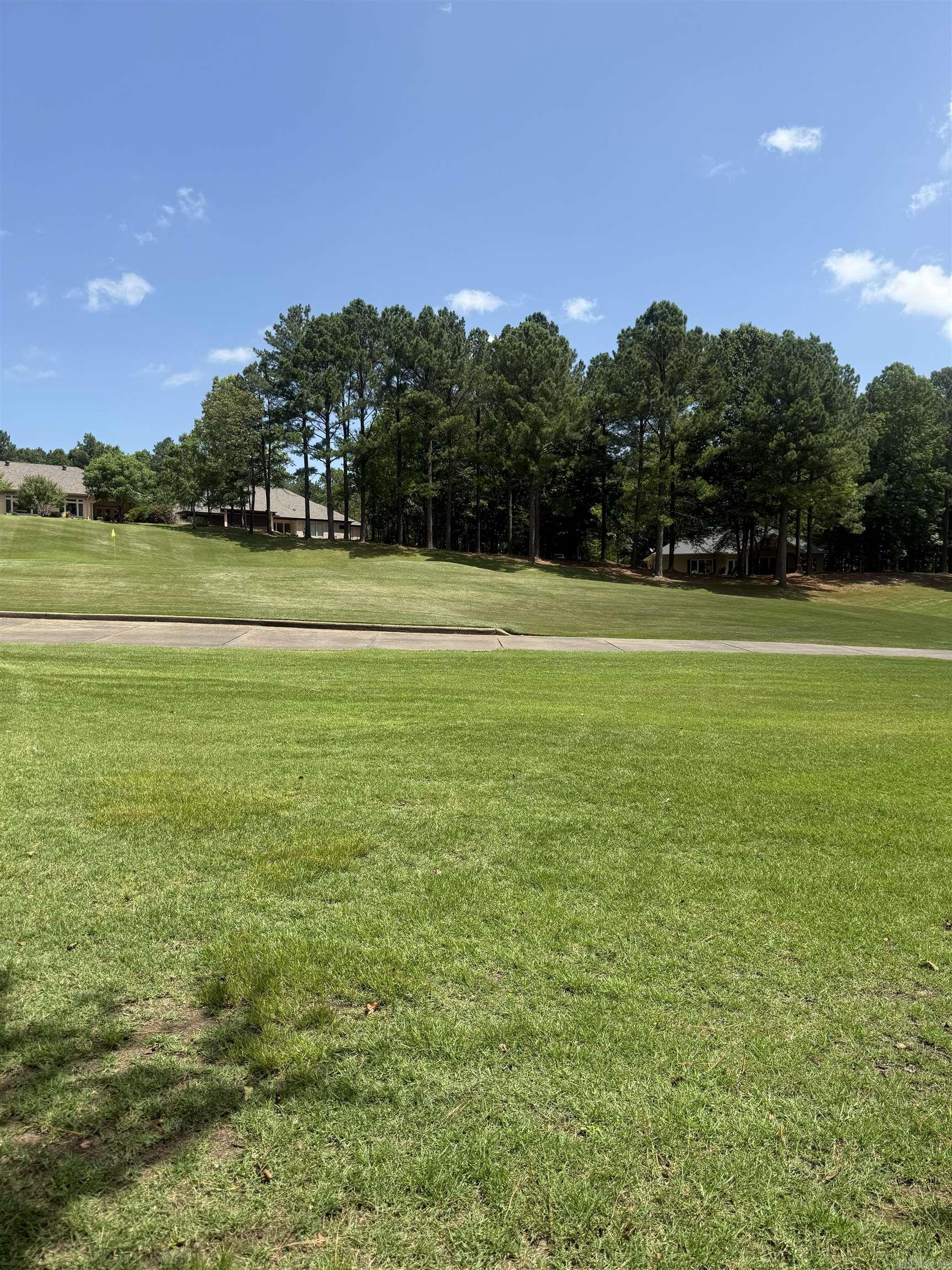 Located on the pristine 7th green of Granada Golf Course, you'll enjoy breathtaking views and a serene atmosphere! This exceptional property offers versatility with the option to enjoy a walk-out or single-level lifestyle, perfectly suited to accommodate all your needs. Nestled among beautifully crafted homes, this residence boasts an enviable address within a picturesque neighborhood known for its charm and sophistication. Just minutes away from the East Gate, convenience is at your doorstep while still providing an exclusive retreat for you to unwind. Imagine driving your golf cart directly from your front door to any of the nearby championship golf courses—each offering unique challenges nestled within nature's embrace. The nation's largest gated community offers 9 beautiful golf courses, 11 recreational lakes with over 30 miles of trails for walking and hiking! New buyers to the Village have a $300.00 buy in fee payable to the POA at closing.