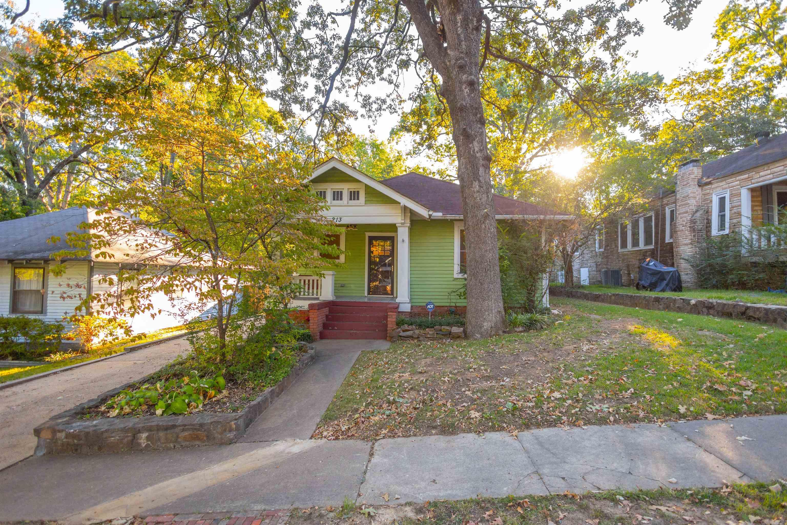Iconic Hillcrest Craftsman Bungalow nestled on quiet street with extensive updates throughout! Fantastic layout with cozy but open living and dining leading into professionally remodeled kitchen with all new custom cabinets, quartz countertops, matching SS appliances, tile floors and backsplash. High end touches continue in updated bath with jacuzzi tub, as well as newly added additional full bath with walk-in shower. Updated insulated double sash energy efficient windows throughout with 2" wooden blinds. Fabulous level fully fenced back yard with covered and uncovered deck perfect for entertaining.