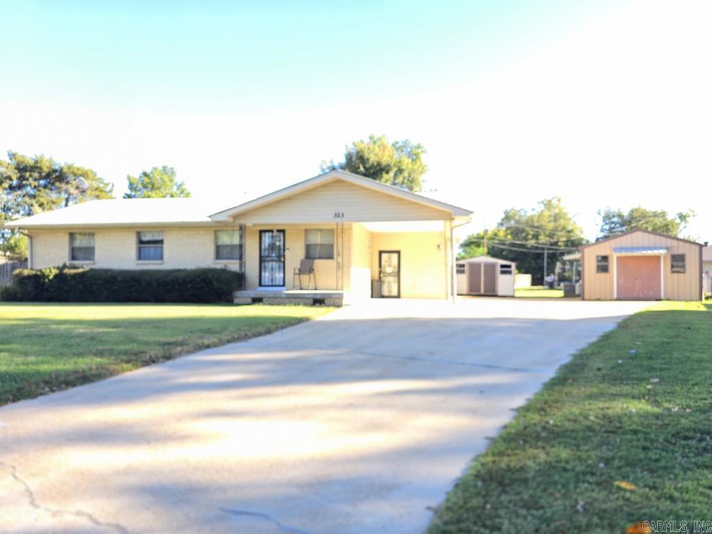 Welcome to 323 Clifton Dr — a well-cared-for 3 bedroom, 2 bathroom home offering space, functionality, and opportunity. Nestled in a quiet, established neighborhood, this property provides a comfortable layout suited for everyday living.  Inside, you’ll find a clean, practical floor plan with generous living space and a layout that flows well. It’s move-in ready while still offering the chance to add your own style and updates over time.  Step outside and enjoy features that set this property apart, including a durable metal roof and a 16x24 heated and cooled shop with 220 wiring — ideal for hobbies, a workshop, or extra workspace. An additional storage building adds even more flexibility for tools and equipment.  Whether you're looking for your first home, an investment opportunity, or a place with room to personalize, this property delivers solid value with plenty of potential.