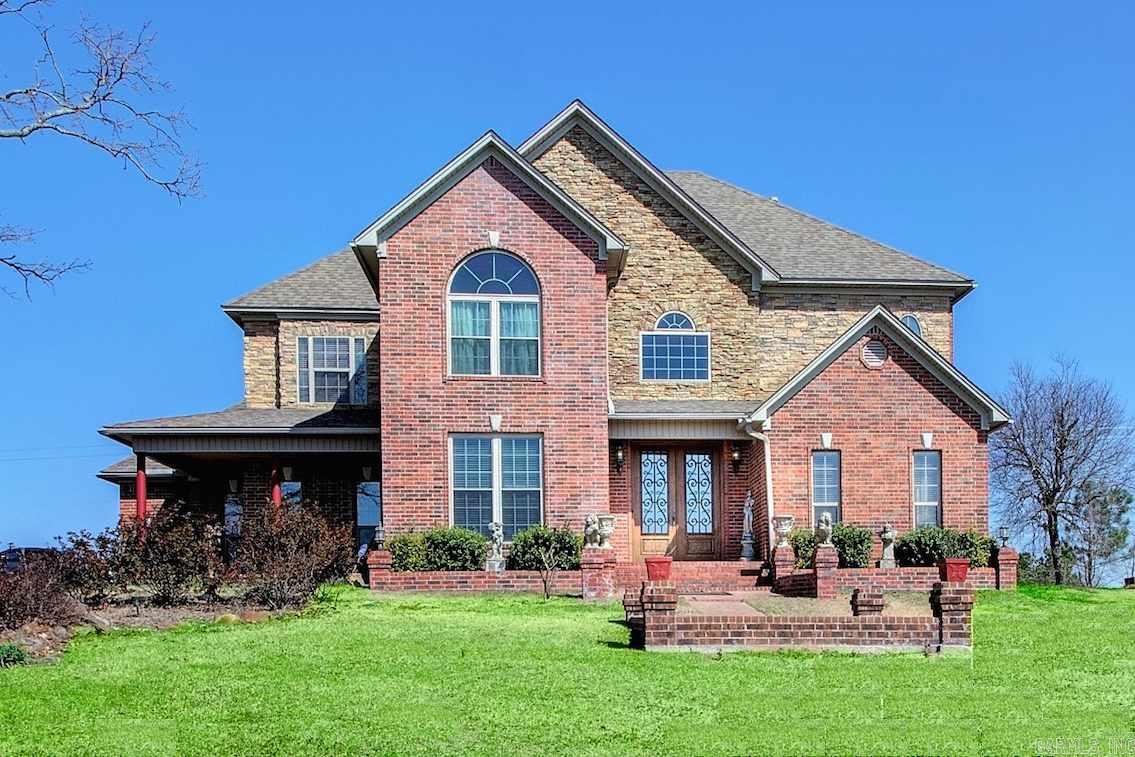 Impressive home in popular Overland Park addition! Minutes from Conway & LRAFB this gorgeous 4 BR/3.5 BA home is nestled on just over 1 acre of sprawling open land space. Spanning over 3,300 SF, this lovely home is graced by soaring ceilings, large windows & a immaculate gas log fire place. This 2 story home is open space & encompasses a formal dining room & 2 living areas. Kitchen updates include granite counter tops, ss appliances, large gas range, island with breakfast bar & built-in wine rack. Come see!