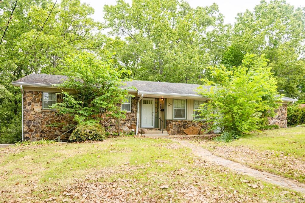 Tucked away at the end of a quiet dead-end street, this spacious 4 bedroom home offers room to spread out inside and out! With minimal traffic and a large backyard, the setting provides both privacy and convenience.  The main level features approximately 1,230 SQFT with 2 bedrooms, 1.5 bathrooms, laundry area, kitchen, and a comfortable living room. Downstairs, the walkout basement adds an additional 1,120 SQFT complete with a second living area, 2 bedrooms, kitchenette, and a full bathroom -- offering great potential for multi-generational living, guests, or extra entertaining space.  Built in 1965, this home features an HVAC system less than 5 years old. Sold AS IS and needing some TLC, it's priced to give buyers a great opportunity to add their own touch and build equity.