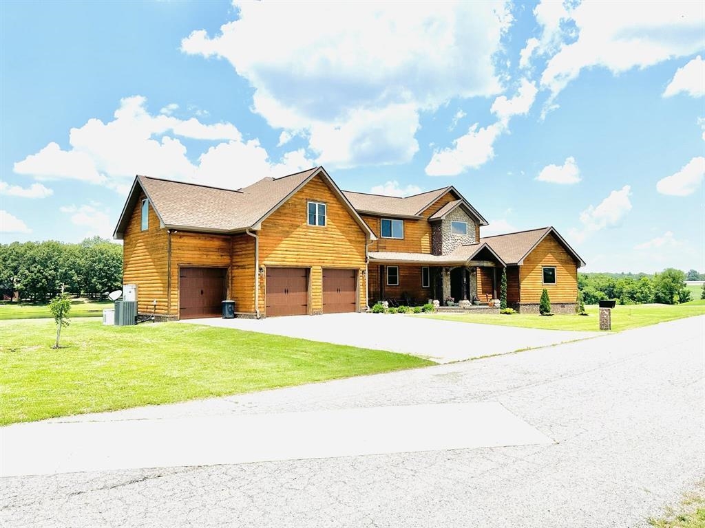 Experience luxury golf course living in the prestigious Cooper’s Hawk subdivision in Melbourne, Arkansas. Built in 2019, this custom 3-bedroom, 3-bath home offers championship golf course frontage and scenic pond views. Designed with craftsmanship and modern finishes, the open-concept layout features high ceilings, luxury flooring, and expansive windows that capture natural light and scenic views. The spacious living area centers around a cozy gas-log fireplace, while the gourmet kitchen impresses with granite countertops, custom cabinetry, premium appliances, and a large island. The main-level primary suite offers a spa-style bath, dual vanities, and a generous walk-in closet. A guest bathroom is conveniently located on the main floor for added accessibility. Upstairs includes two additional bedrooms, a full bath, and a flexible loft ideal for an office or media space.  Conveniently located near Melbourne’s amenities, this move-in ready home delivers the perfect blend of luxury and location—priced at $423,500 in one of North Central Arkansas’s most desirable golf communities.