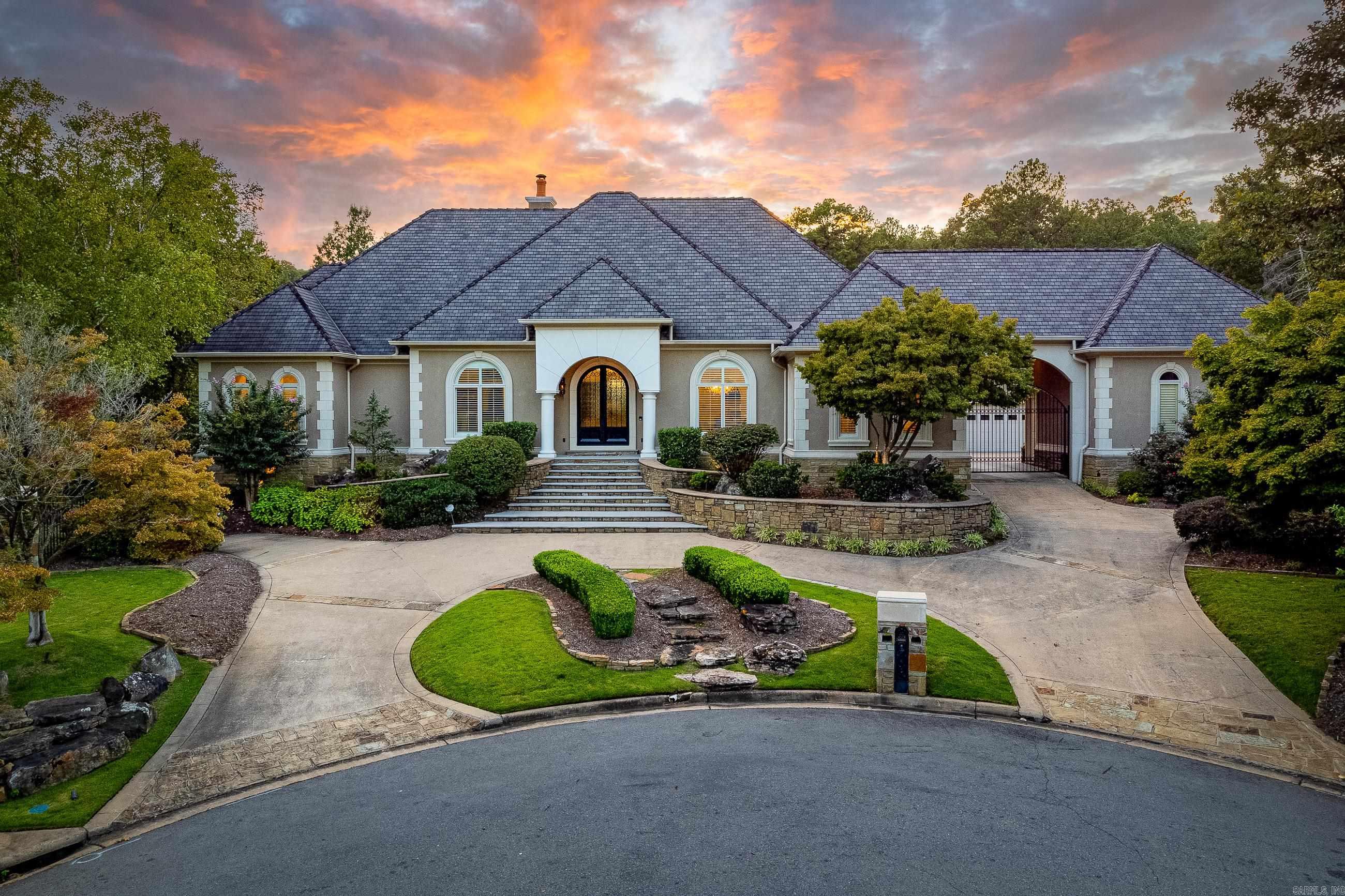 Welcome home to this private and secluded estate nestled away in a quiet cul-de-sac in the prestigious neighborhood of Valley Falls Estates, offering amenities that no other home offers.  This astounding property sits on over an acre with incredible views of the magnificent backyard. The main home is 6,033 square feet plus a guest home with 647 square feet. This masonry stucco and rock home was custom built for the original owners. The current owners thoughtfully and meticulously renovated the home in 2020 with acclaimed interior designer Angelilne Guido Hall and builder Bradford Harris. Renovations include an incredible chef’s kitchen, updating of all bathrooms with high-end fixtures, new iron doors including a telescoping patio door creating a movable glass wall, new hardwood flooring throughout, custom wallpaper and new paint along with a truly a magnificent hardscaped backyard! The backyard offers an abundance of outdoor entertainment areas and sun-soaked terraces that consist of a large covered porch with fireplace, unite pool with new plaster and tile, unbelievable chef's outdoor kitchen and pond with stocked fish. Four car garage, Control 4 smart home automation plus more!