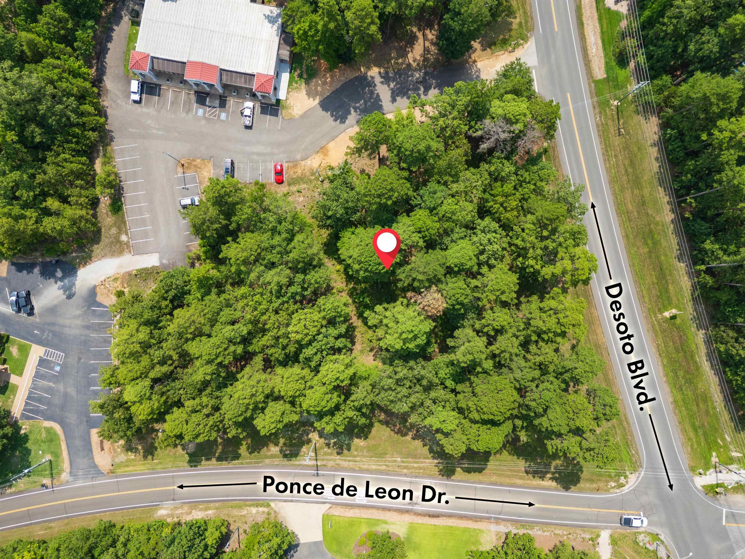 ESTE CENTER,HOT SPRINGS VILLAGE,AR.  For S   Este Commercial: Unimproved 1.03 acres. Corner Desoto and Ponce de Leon, the  most desired upscale area of this multi-billion dollar 26,000 acre.  Gated community in the scenic Ouachita Mountains. Site is in the midst of banks, medical, and professional buildings. Great opportunity for additional high end development.