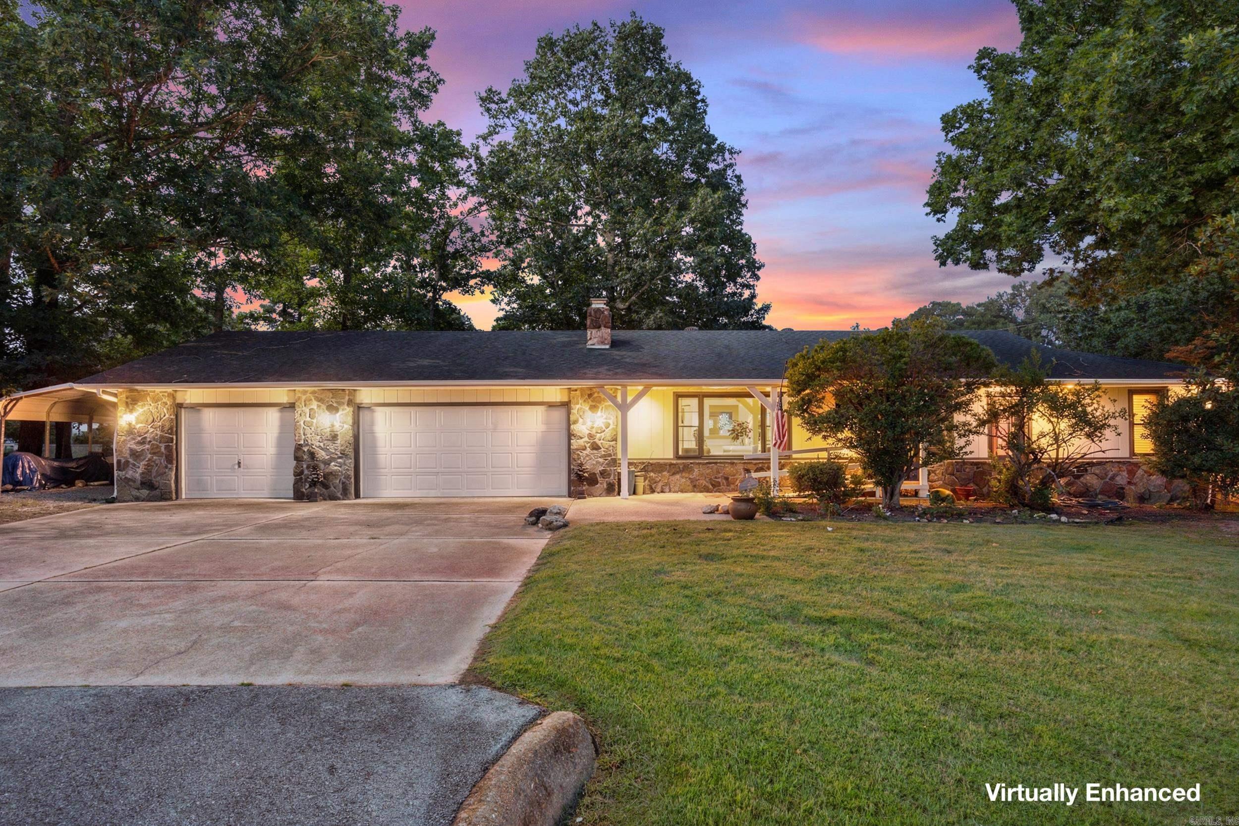Beautifully updated 4-bedroom, 2-bath home in Mountain Home, Arkansas, located on a corner lot in a quiet subdivision just 2 miles from Buzzard Roost Marina on Lake Norfork. Offering over 2,286 sq ft of single-level living, this move-in ready home features an open and inviting layout with fresh paint, updated flooring, and granite countertops in the kitchen. The spacious living areas provide flexibility for everyday living and entertaining, while the heated and cooled sunroom offers year-round enjoyment. A versatile bonus room can serve as a home office, hobby room, or playroom. Outside, enjoy a large fenced backyard and an oversized deck perfect for gatherings. The attached 2-car garage plus an additional garage bay/workshop provides excellent storage for vehicles, tools, lake toys, or hobbies. Conveniently located near Lake Norfork, boating, fishing, shopping, dining, schools, and medical facilities, this home combines space, updates, and an unbeatable location.