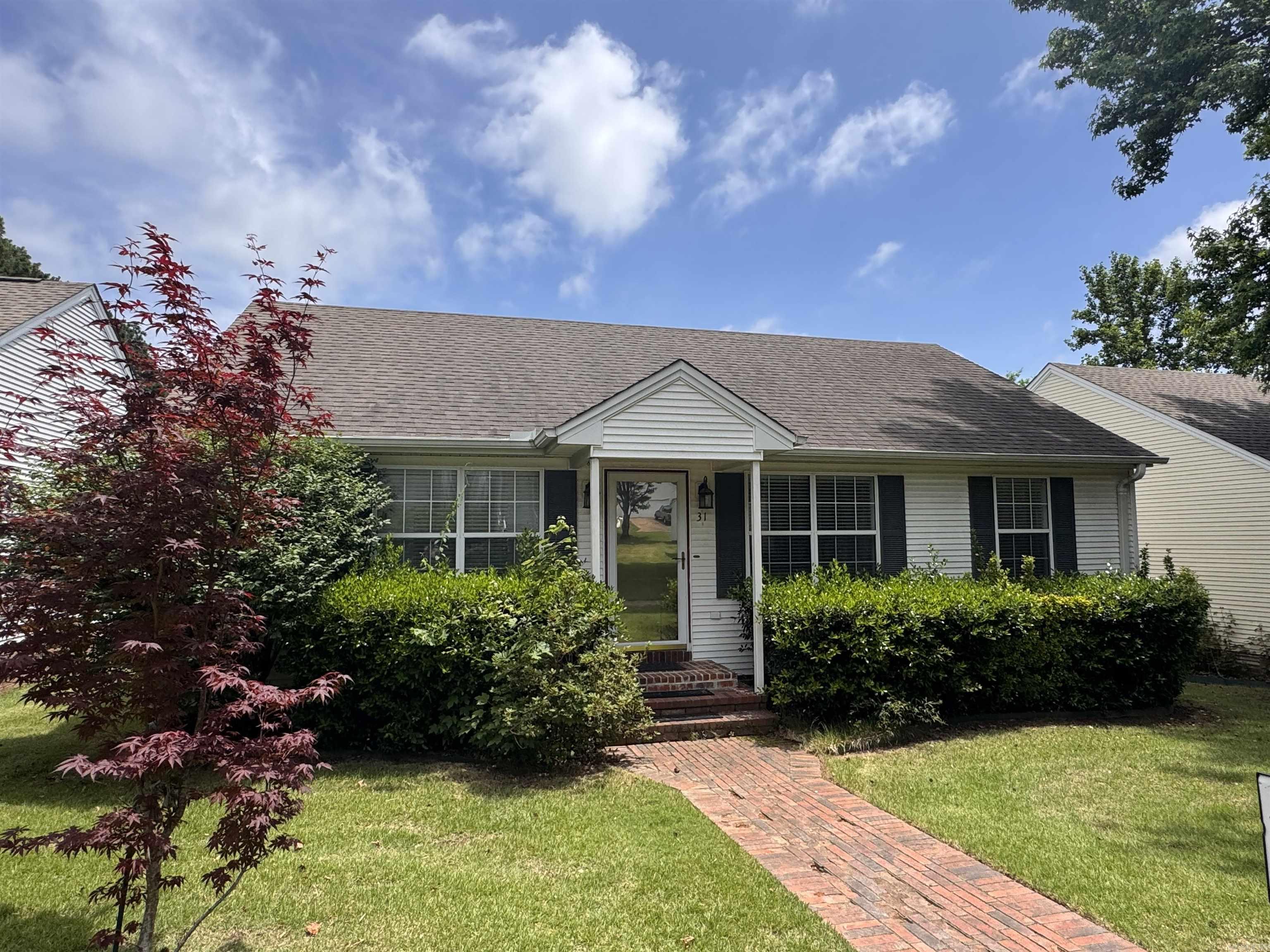 This lovely stand-alone condo in River Oaks Trace is located near the hospital, medical, retail and offers low-maintenance living at its finest! Walk in the front door and you'll find a large living area open to the kitchen, ample cabinets and counter space, a separate laundry room, laminate floors & bedrooms on each side of the home with HUGE walk-in closets! One bathroom features a safe walk-in tub. There is also a FEMA approved storm shelter in the garage. There is parking for guests behind the home as well as the side of the courtyard with a lovely brick sidewalk leading to the front door! Refrigerator, washer & dryer remain with the home. Monthly dues cover all lawn, exterior maintenance including roof, sprinkler, termite contract & exterior insurance. Call today for your tour! (agents see remarks for showing instructions)