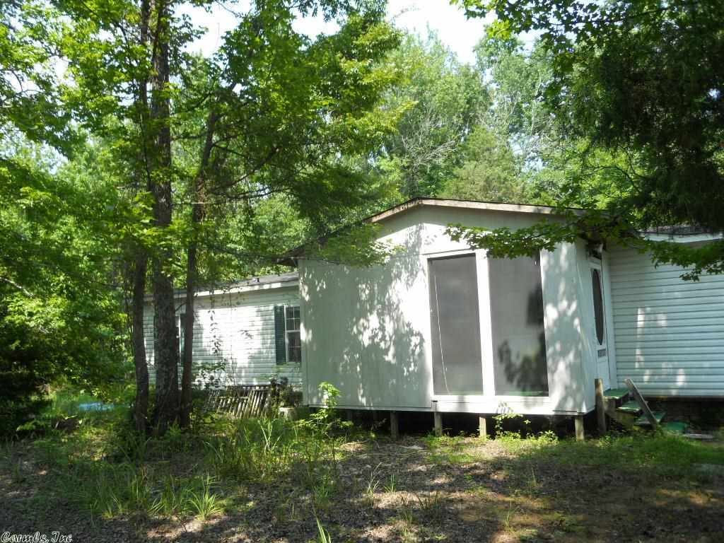 Very nice 3 bedroom-2 bath double wide on permanent foundation sitting on 4.4 acres.  Call now!  (See agent remarks.)