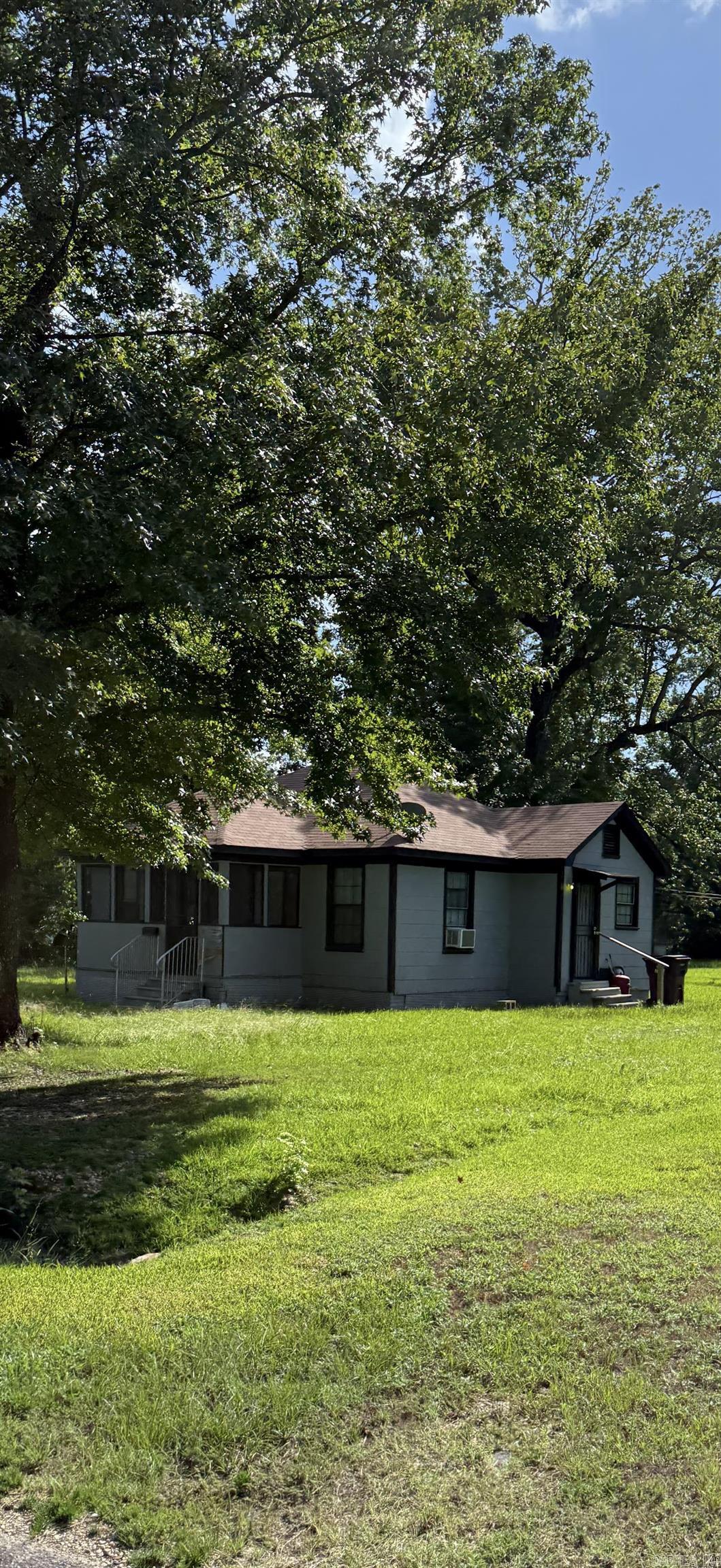 Move in ready starter home. Well maintained 2 bedroom 1 bath. Sofa, washer, dryer, refrigerator, and stove are included. Large level lot allows for plenty of outdoor activity and easy to maintenance. This is a must see. Owner is willing to finance for a qualified buyer with a decent down payment.