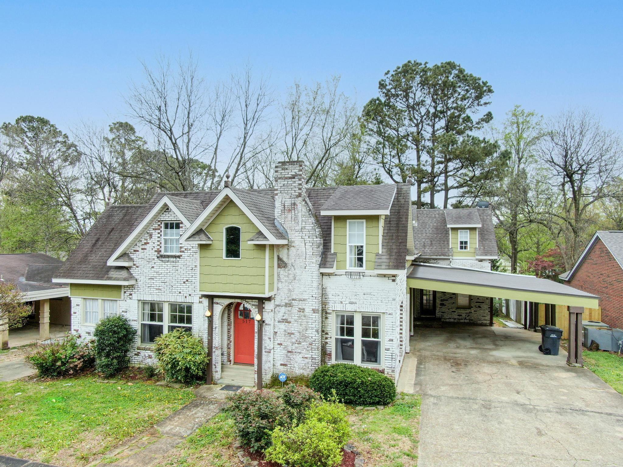Get ready to ENTERTAIN In this beauty & It is Move In READY! Some of its features are: Three separate living areas, Den / TV Room on both levels, a sunroom for the warm sunny Arkansas days. Formal dining room, Large vaulted kitchen with copper sink, eat-in breakfast dining, granite and stainless appliance. Two potential art gallery spaces. Large first floor master bedroom w on-suite and tv niche. Several decks and backyard cabana. 4 bed / 3 bath Beautiful and artful staircase with eclectic embellishments. Two separate driveways, one a double car Porte Cochere'. Outdoor separated and locked storage room. Patio and fire pit. Plenty of storage in basement and a tornado safe-room. A very well built and energy efficient home. Dead center of Jonesboro, close to shopping, downtown and numerous Churches. All appliances convey, washer, dryer, refrigerator, stove. All furnishing, decor, artwork is negotiable.