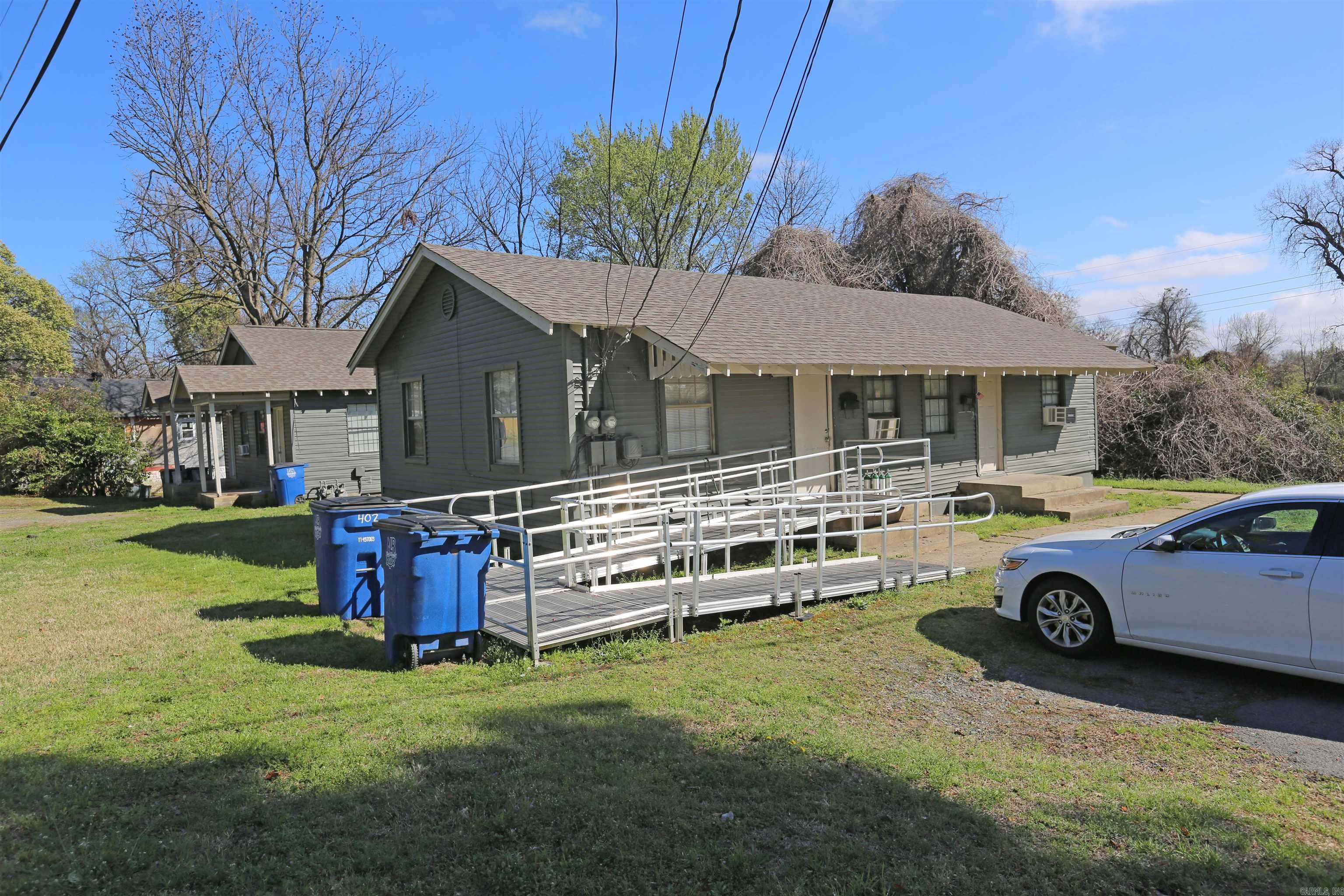 Two duplexes on one parcel offering a fantastic investment opportunity in a rapidly developing area! Both units have been thoughtfully updated with luxury vinyl plank flooring throughout, granite countertops in the kitchens, new cabinetry, updated appliances, and modern fixtures. Major improvements include roofs replaced in 2020, and the siding is in good condition, making this a solid, low-maintenance property. Located just minutes from downtown Little Rock and the vibrant Argenta Arts District, this property sits in a thriving area known for its arts, dining, and entertainment scene. Agents see remarks.