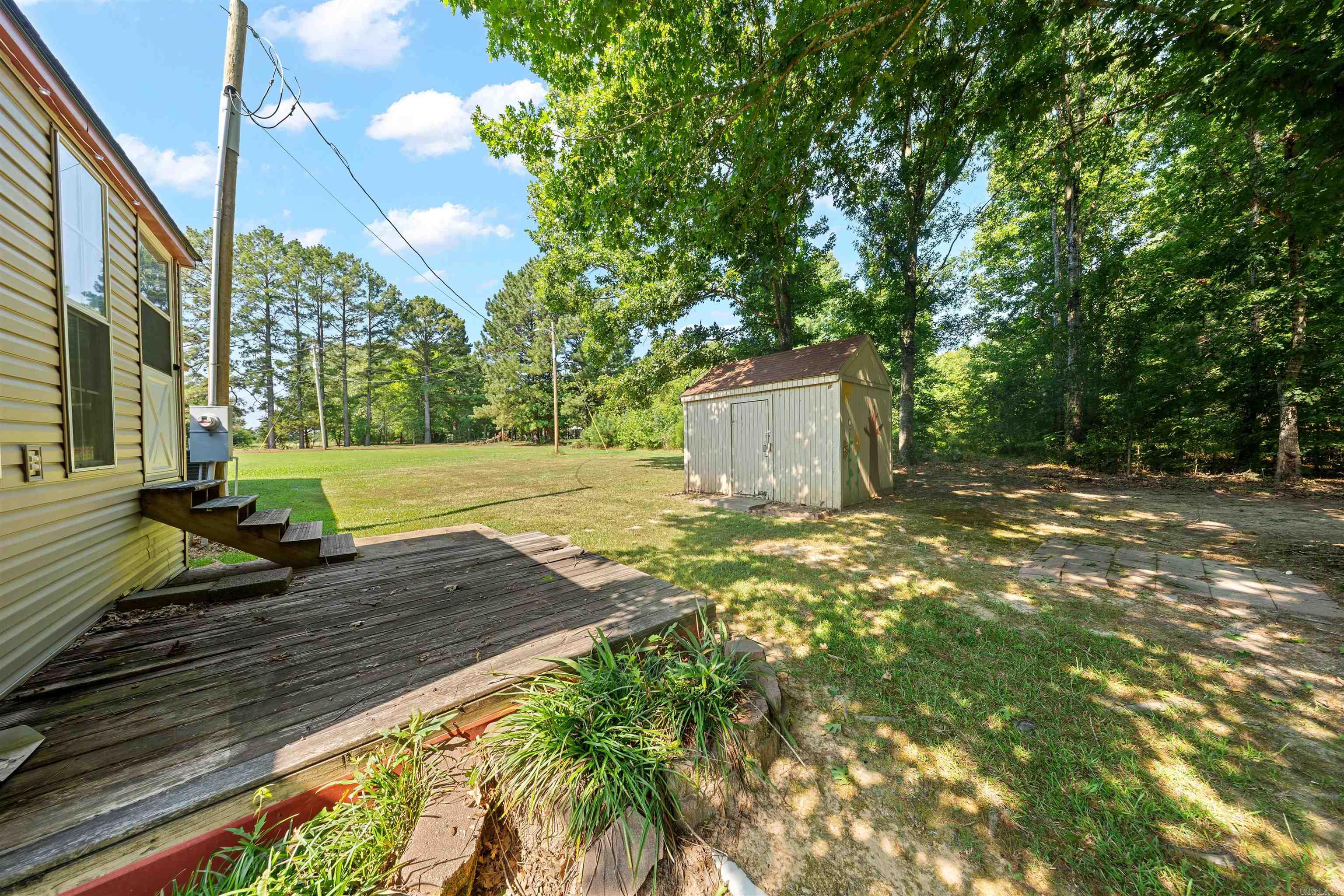 This cozy, move-in ready home sits on a full one-acre lot and is packed with updates, including a new roof, new HVAC, updated flooring, and all appliances convey with the sale. It also qualifies for conventional, FHA, VA, and Rural Development financing, making it a great option for a wide range of buyers. If you've been looking for a home with land, modern updates already completed, and flexible financing options, this one is worth a look. Schedule your showing today!SEE AGENT REMARKS