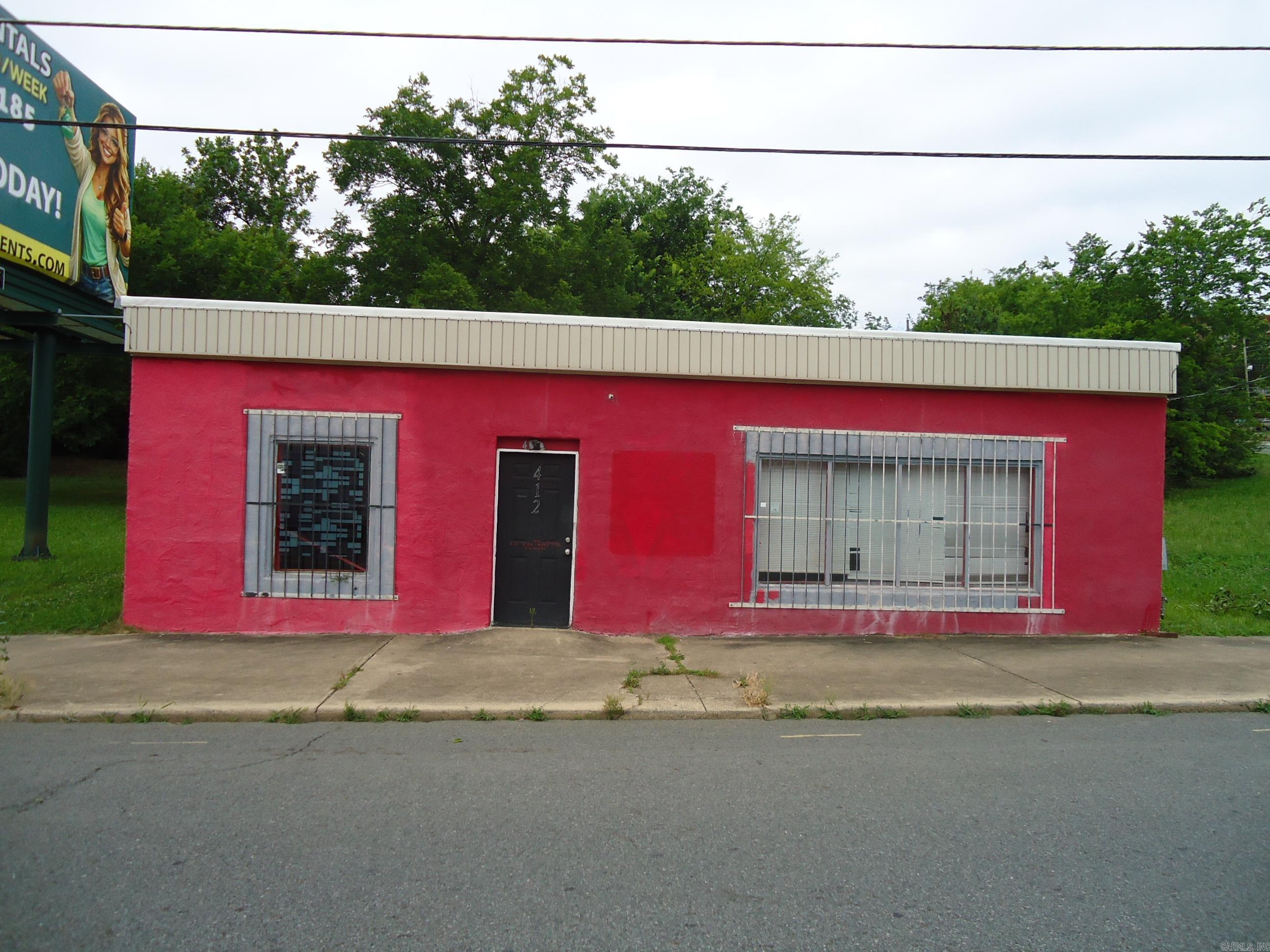 Commercial building located on Broadway Street near West Grand Avenue. The general area is an older historic "type" of area which was dependent in the past on a railroad spur for the warehouses. The property is very near the Historic Transportation Depot area, the Hot Springs Creek Greenway and the Farmers Market. Also, property is fairly close to the downtown Hot Springs Historic areas. Building is nearly 100 years old and still has some of the exposed interior brick walls. Property is zone commercial, C-G with many possible uses. Part of the properly is located in a flood plain. Some of the nearby properties are being renovated for current uses with the older styles. Some information has been taken from City and Garland County records, i.e. approximate lot size, taxes, zoning, etc. Please feel free to verify.