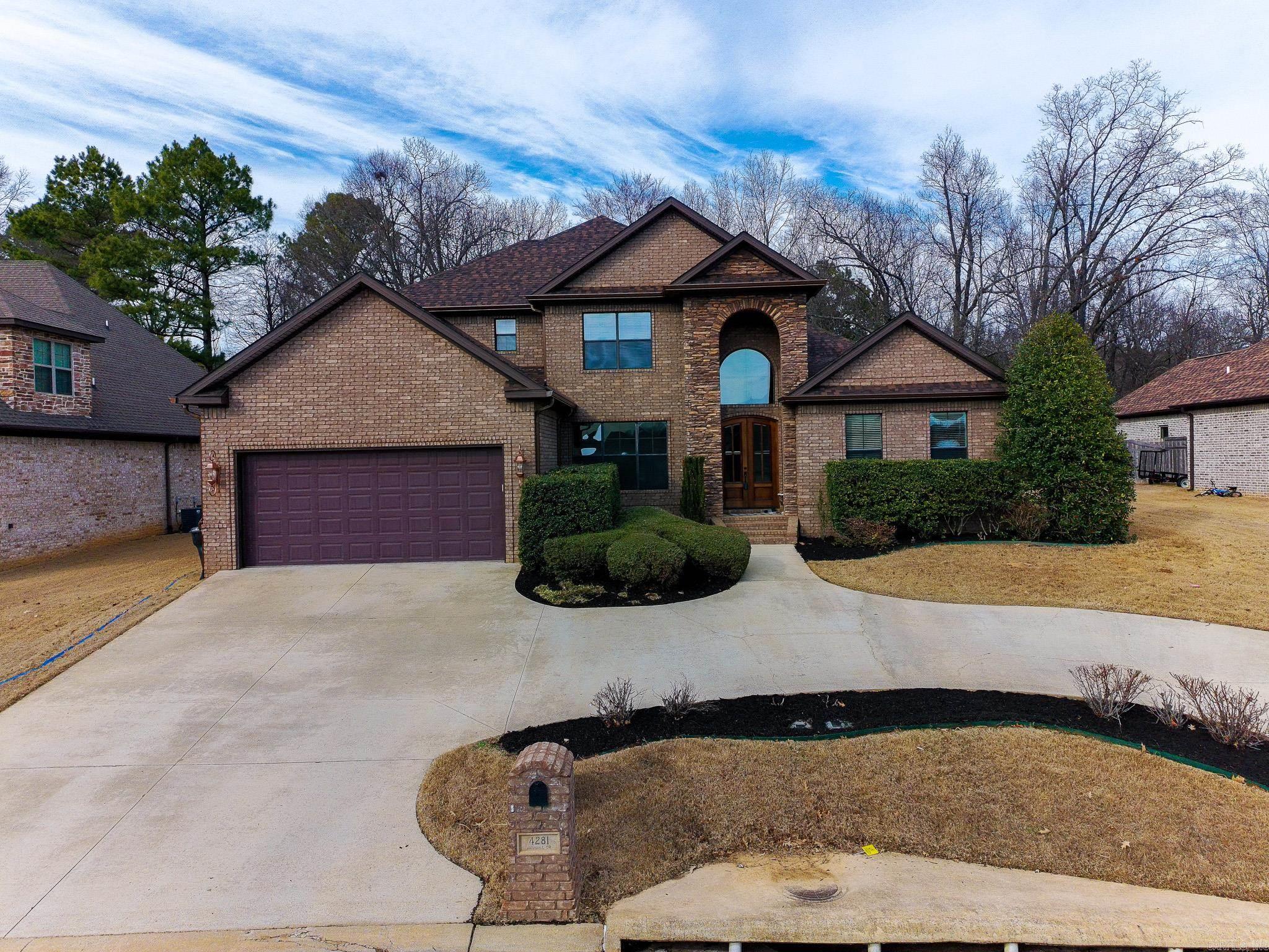 Say hello to this stunning 5 bedroom 4 bathroom home in Barrington Park! This home spares no details; from the dual staircases, beautiful stone fireplace accompanied by custom built-in cabinetry, the hammered copper sink surrounded by beautiful granite countertops..this house has it all! There is a space for everything you may need: office space, formal dining room, laundry room, plenty of closet space, a second living area upstairs, the list goes on and on! Step outback to your own slice of paradise! The backyard features a heated gunite saltwater pool with a waterfall and a slide. This is the perfect house for entertaining and will find your guest not wanting to leave! You don't want to miss this one!