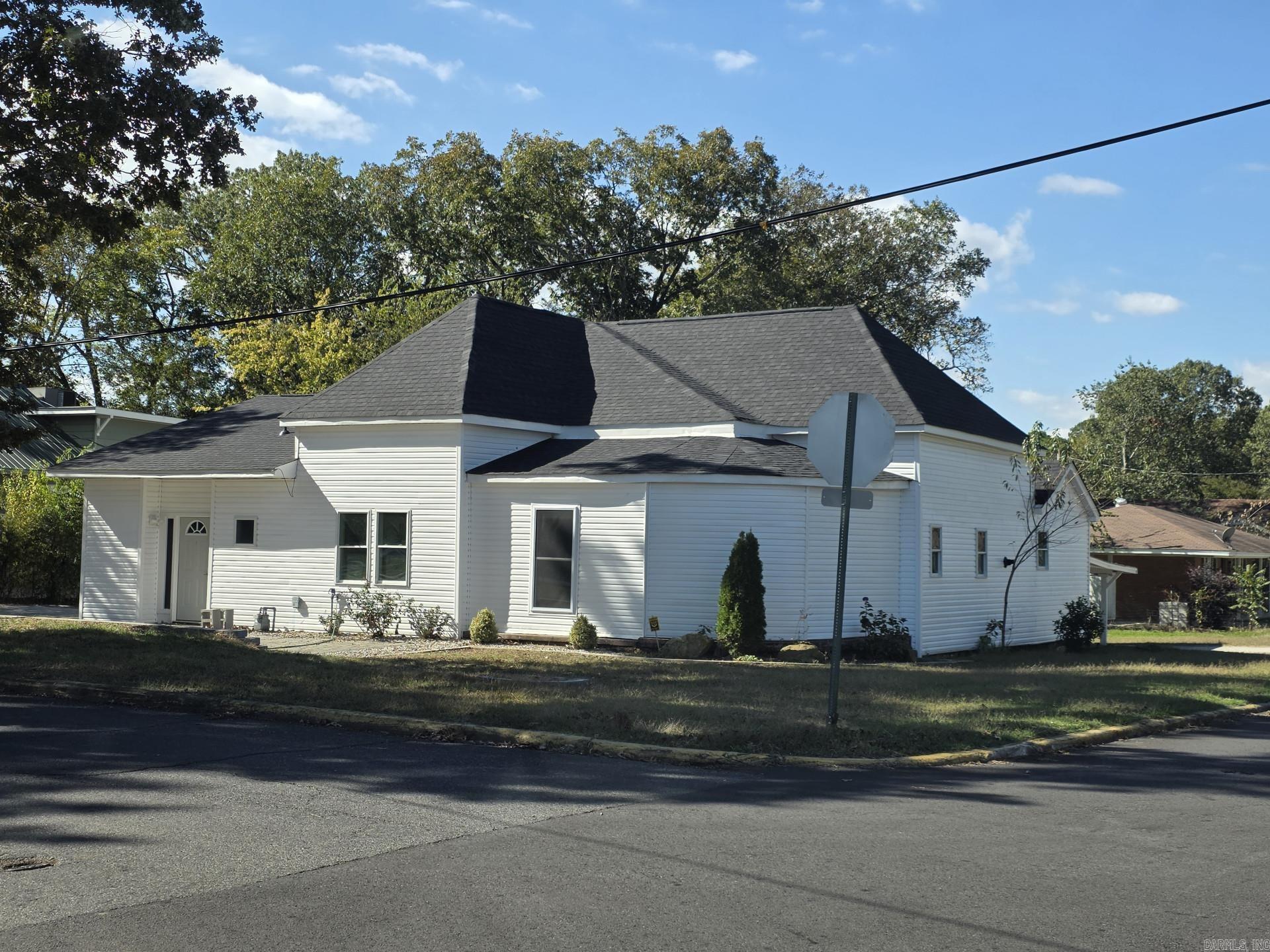 This charming single-family home located at 400 Clark Street in Hot Springs, AR was built in 1939 With 3 full bathrooms, +/- 2,489 sq.ft. this property is perfect for a growing family or those who love to entertain. Situated on a spacious lot 15,000 sq.ft., there is plenty of room for outdoor activities and gardening. Home is 4 Beds + 2 Bonus Rooms 3 Baths. Ample Parking Corner Lot Across from Oaklawn STEM Magnet ELementary           Highlights*Large +/- 2,500 sq ft single-family home*New Roof, New Windows and new siding.*4 generous-sized bedrooms, plus 2 additional upstairs rooms (ideal for office, playroom, or media)*Corner lot location offers extra privacy, curb appeal, and yard space*Parking for 7+ cars perfect for families, guests, or those with multiple vehicles*Walking distance / directly across (kiddie-corner) from Oaklawn STEM Magnet Elementary School (301 Oaklawn Blvd) Hot Springs School District*Quiet residential area with strong school access*Corner lot gives more yard frontage, landscaping opportunity, and extra privacy*Easy access to local amenities (shopping, parks, dining)*Convenient to major roads and commuter routes