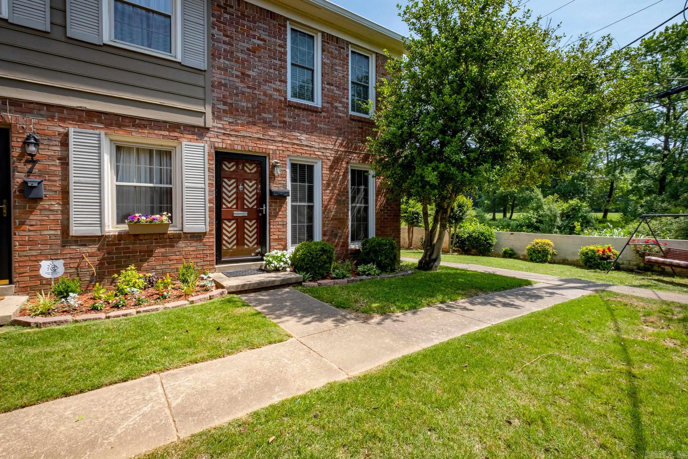 Updated 2 bedroom condo in the heart of Little Rock! On the main level, this desirable end unit features newer beautiful laminate floors, a spacious living area, an eat-in kitchen with quartz countertops, half bath, pantry & storage/coat closet. Upstairs, there are two large bedrooms and a full bathroom with shower/tub combo. There is also a great private patio & storage room with washer and dryer! Close to restaurants, shopping, interstate and more! POA covers grounds, roof, gas, water, termite policy and hazard insurance.