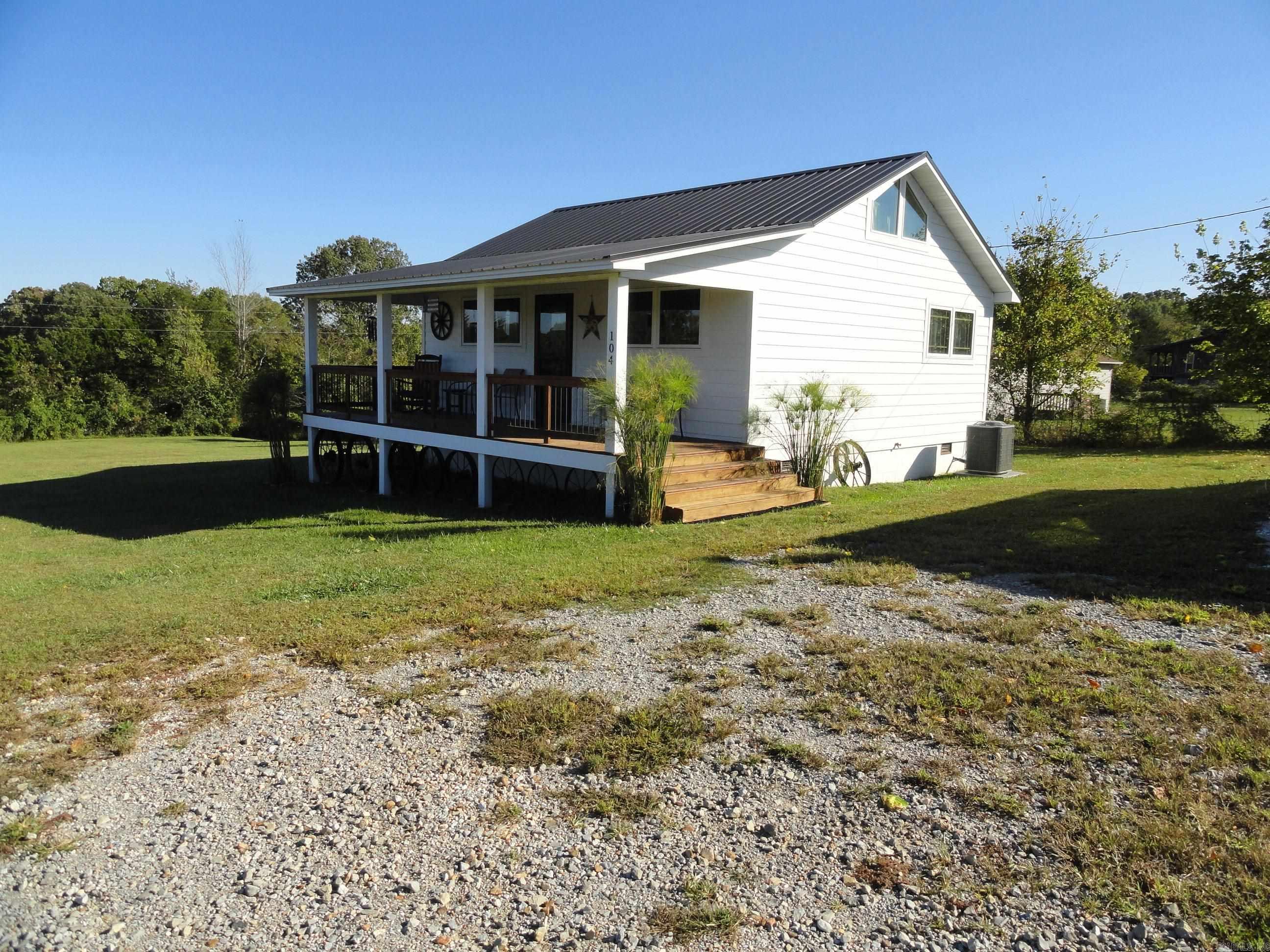 Rare income producing opportunity. Fully furnished & decorated, small vacation house/Airbnb in the heart of the Ozark mountains in north central Arkansas & only 2 miles from Buffalo National River. BNR is a well-known tourist destination river that offers visitors a wide variety of outdoor activities such as kayaking, canoeing, swimming, fishing, camping, hiking, horseback riding, hunting & exploring. Use this property for your own house or personal get-a-way throughout the year and then when you are not using it, rent it for nightly rental. The nightly rental income can supplement or maybe, make your monthly payments. The property comes with over a ½ acre of land for adding on or to build a 2nd dwelling. The house has paved road access, 624 sq ft & a 12’x11’ loft for overflow sleeping. This 2 bed 1 bath comes with washer, dryer, elec cook stove, frig, dishwasher, central heating & cooling, metal roof & “Smart Siding” exterior for worry free maintenance & spray foam insulation. Hardwood floors with ceramic tile in the bath & carpet in the bedrooms, covered front porch, back deck & a 18’x20’ detached garage & RV pad w/power. Move in/rent ready, just bring your clothes & groceries.