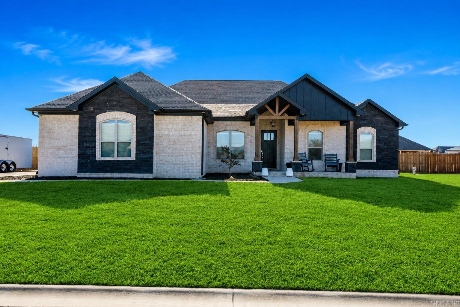 Beautiful 4 bedroom, 2 bathroom home on a spacious 0.48-acre lot in a desirable Cabot neighborhood. This split floor plan features a private primary suite with a spa-like bathroom and large walk-in closet, plus an open-concept kitchen and living area with electric fireplace, formal dining room, breakfast nook, and oversized walk-in pantry.The additional bedrooms offer plenty of space and storage, while the laundry room includes a sink and built-ins for convenience. Enjoy the covered patio with a wired-in hot tub that conveys, along with a double garage with extra height and an extended concrete pad perfect for RV or extra parking. Conveniently located close to shopping, dining, schools, and everything Cabot has to offer.