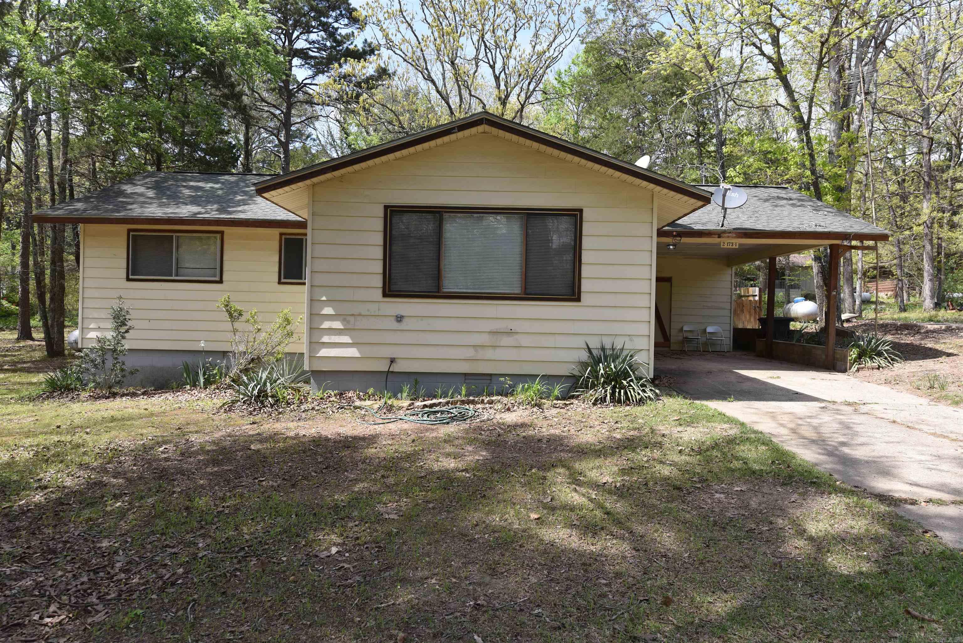 LOCATED NEAR THE FAIRFIELD BAY MARINA, welcome to this move in ready, LAKE HOME.  This is the perfect second home, vacation home, rental, or your cozy dream home.  Featuring a screened in back porch, 3 bedrooms, vinyl plank flooring, eat in kitchen, oversized laundry area, and appliances are included.  Located in the picturesque, Ozark town of Fairfield Bay, Arkansas, nestled on the shores of Greers Ferry Lake with amenities such as 3 swimming pools, full-service marina, 2 golf courses, tennis & pickleball courts, ATV trails, dining options, mini golf, bowling alley and more this truly is a lake house gem.