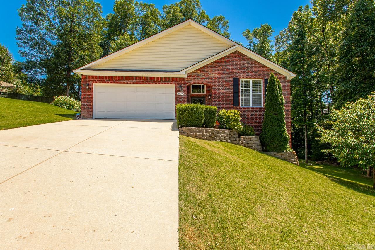 This home is in immaculate condition! Located in the establish Hartford Hills subdivision close to town but with plenty of privacy. No neighbors to the right & a family of deer living in the tree space. This home has an open floor concept, hardwoods, fireplace, updated kitchen with granite countertops, breakfast bar and new appliances. Lots of windows in the greatroom that allow you to see the tree tops in your back yard. There is a diningroom/office that could be used for a 4th bedroom because it has a closet. Spacious primary suite, bathroom has large whirlpool tub & separate walk in shower with two spacious walk-in closets. New two story deck on the back perfect for entertaining and overlooking the private back yard. Basement is encapsulated and perfect for extra storage! Pictures do not do this one justice, in excellent condition. New capacitor to AC unit and new roof. Washer and dryer will convey with acceptable offer.