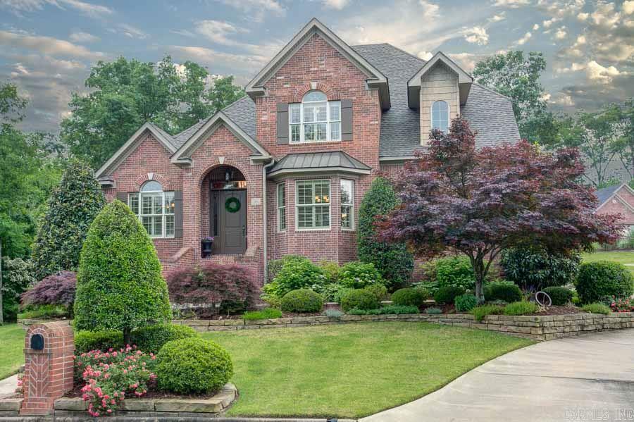 Stunning 4 bedroom, 4 bath, office(5th bedroom), bonus room, and huge playroom. Open floor-plan with living room overlooking screened porch, water feature and green space. 2 gas log fireplaces, side load 3 car garage, circle drive and gorgeous custom landscaping. A MUST SEE!