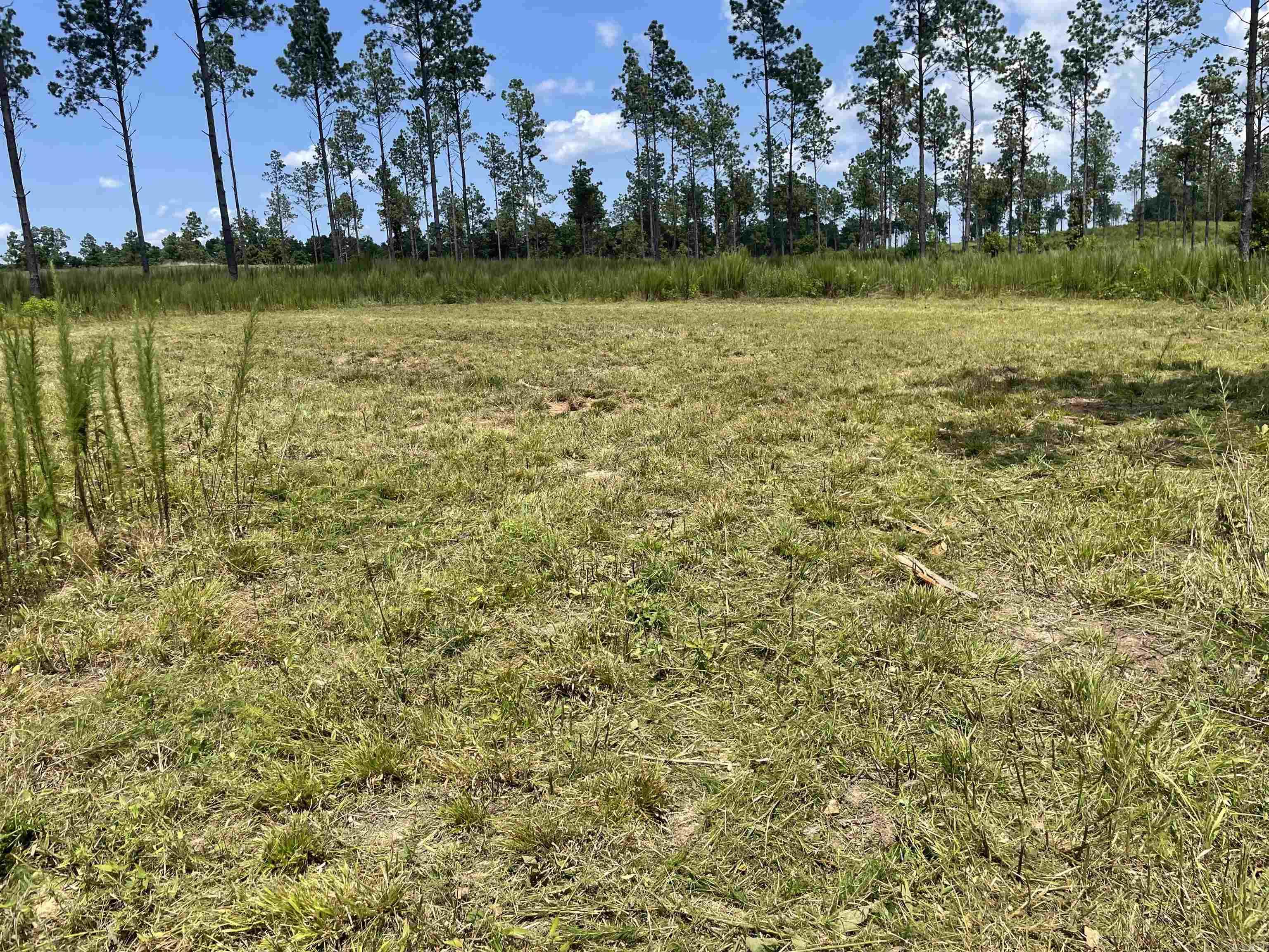 Four lots-pick your favorite!*this lot has a house pad with the stumps already cleared*pretty tract of land past the Sheridan Golf Club*under the MLS documents, you will find a drawing of the land and the restrictions*this is tract "D" on drawing*prelim perc already available* Directions: Take Grant 43 (aka Country Club Road) and go about 1.5 miles.  Property is on the left. Across from Grant County Road 433.
