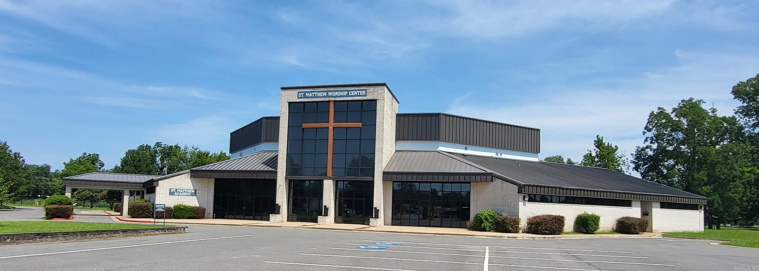 Beautiful 19,671 +/-  sf building on 5.01+/- acres near LR River Port.  Visible from 440, this spacious, elegant building has sanctuary for 300+ classrooms, commercial kitchen,  fellowship hall, offices, pastor's study, and a 6,112+/- square foot activity center/educational facility to be finished out by the new owner. Paved parking w 150 spaces, and green space for additional construction.  New roof and extensive interior remodel in 2023! Building is leased to a tenant on a 5-year term, making this an excellent investment opportunity!  See brochure in docs. Selling as-is. Agents see remarks.