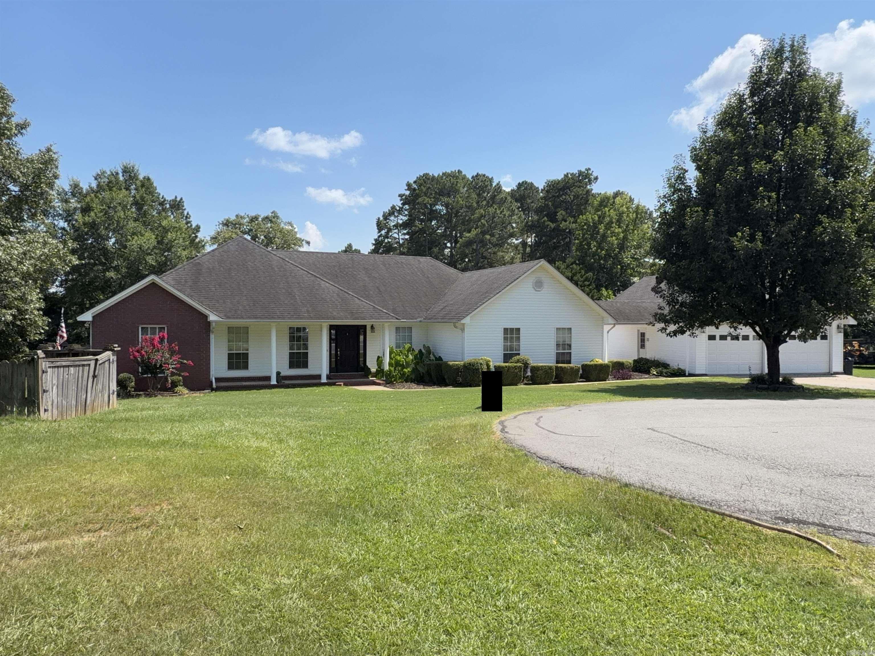 Welcome to your dream home at the end of a quiet cul-de-sac! Nesled on a beautiful 1 acre lot, this well maintained 2,438 sq ft home offers the perfect blend of privacy, comfort, and functionality.  Built in 2005, this spacious 4 bedroom, 2 bathroom home features an inviting open layout with room for everyone.  The heart of the home is the large kitchen, complete with abundant cabinetry and generous storage, making meal preparation and entertaining a breeze.  The cozy living room is anchored by a beautiful fireplace.  The spacious bedrooms provide comfort for every member of the family.  Step outside into your own beautifully maintained yard with plenty of room for the kids to play and pets to roam.  Located at the end of a cut-de-sac you get the privacy and minimal traffic. 2 car detached garage, mature landscaping and just minutes from schools, shopping and all the conveniences of Sheridan. Schedule your private viewing today by calling Season Nichols @870-723-3757