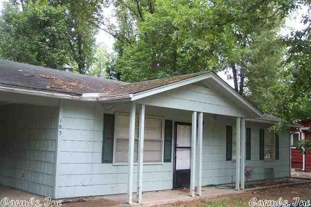 Within blocks of Lake Sequoyah beach and Highway for shopping and schools.  Carport has screened windows--use it as a covered patio!  3 nice sized bedrooms; master large enough for king bed plus more and has private bath.  Stove and fridge included in sale price.  Central heat and air.  Rear chain link fenced yard with patio.  Newer carpet/vinyl and interior paint.  Property owners have access to 7 lakes, 2-18 hole golf courses, community centers and nature trails