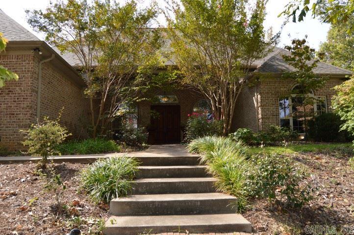 Magnificent home in The Hills subdivision sitting on 3.04 acres. The Master bedroom is 15/22, there is also a safe room. Marble floors in the living and dining area. Hardwoods in the hallway and kitchen. The kitchen has beautiful granite counter tops and a granite bar, also a den with a gas log fireplace off the gourmet kitchen. The marble floors from the living area flows into the master bathroom surrounding the Jacuzzi bath tub. The flowers and spring bushes are surrounding the home. Also a 2000sq.ft shop