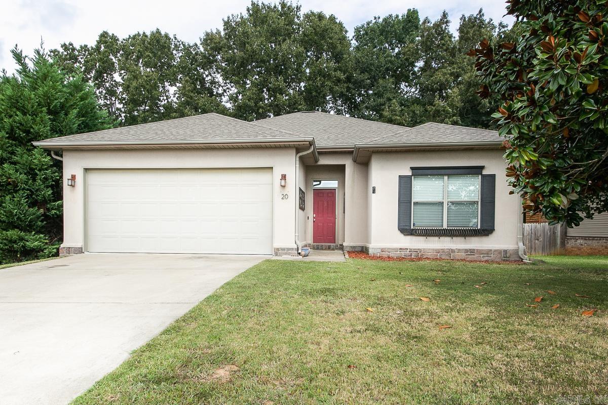 Beautiful 3 bedroom 2 bath home with an open floor plan, wood flooring, fireplace, stainless steel appliances, mini blinds, master bath has double sinks, jetted tub, separate shower, and 2 walk in closets. Complete with a spacious wood deck overlooking pond, brick patio, gutters and a privacy fence.  No smoking in home/garage.   Application/Background Check/Security Deposit required