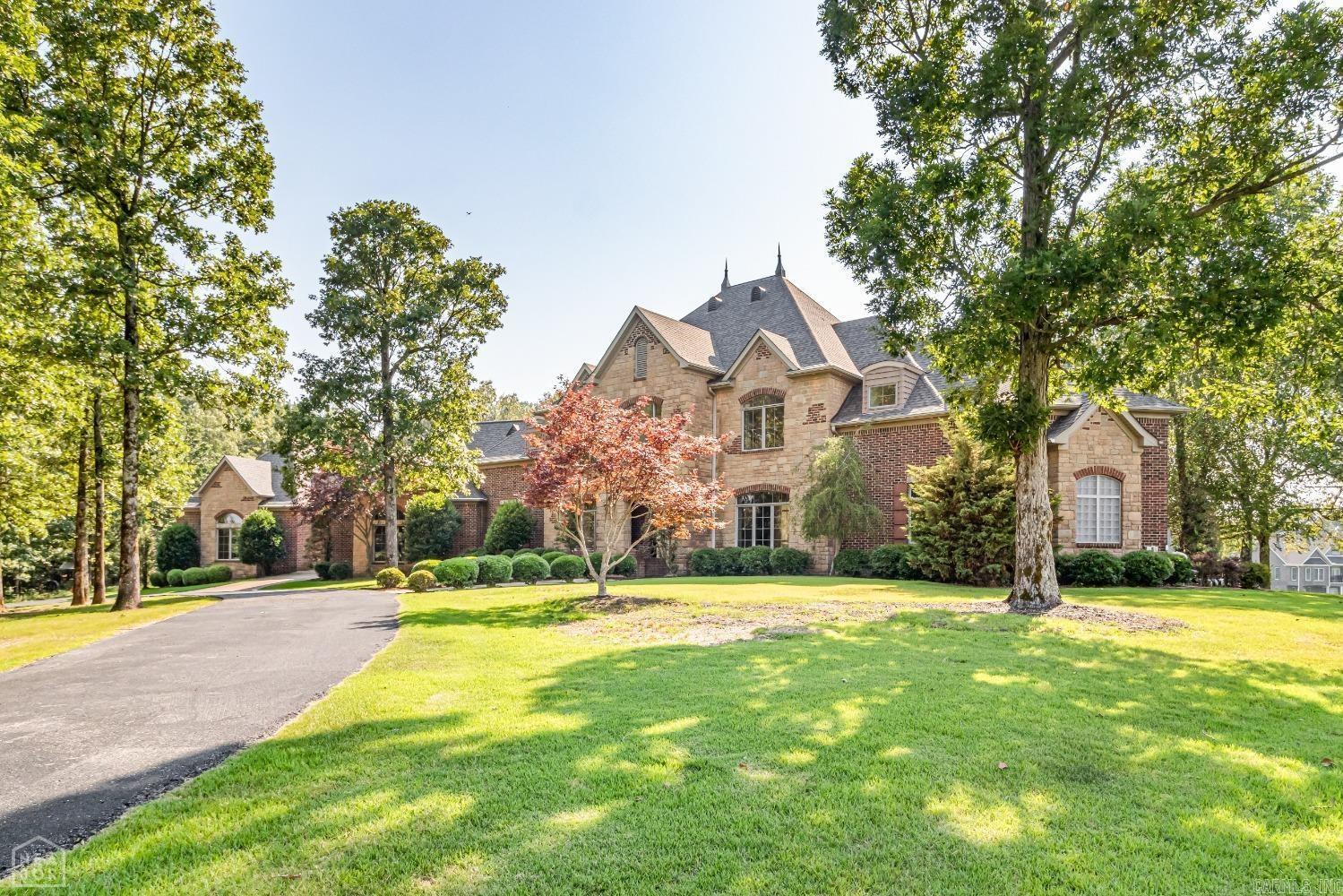 Welcome 1236 CR 759!!   This stunning country Estate is perched on 3.9 acres with picturesque views from every corner. You walk in the huge double doors and immediately are amazed at the floor to ceiling picture windows offering gorgeous views of the countryside. Hand scraped hardwood floors and brick accent walls boast the Old World feel of this truly one of a kind estate.  Call to set up a tour today!