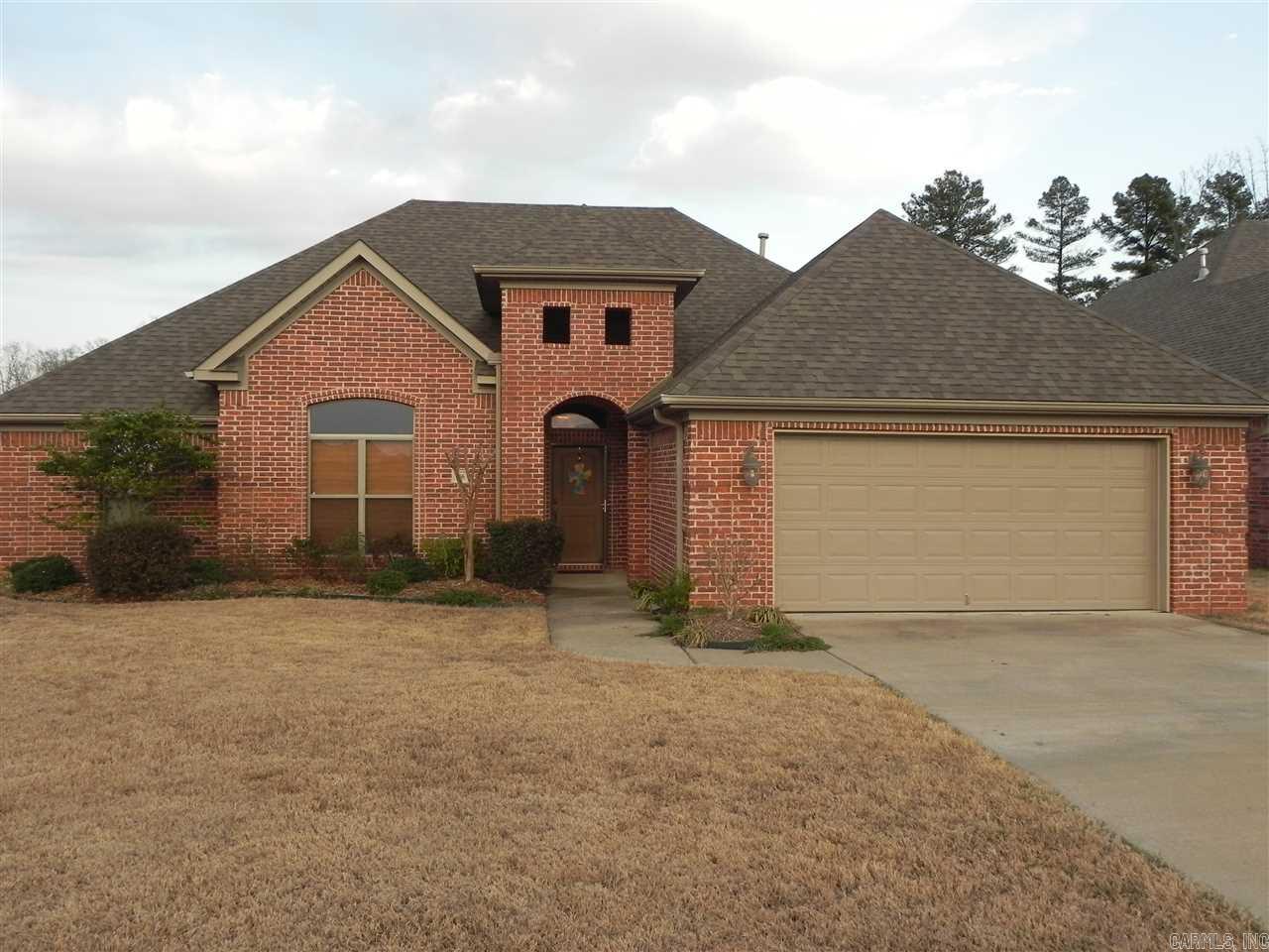 A great house in Country Club of Arkansas in Maumelle. 12 ft ceilings in entry & living rooms w/ lg arches that open and flows nicely into kitchen. Chefs dream kitchen  w/ stainless steel appliances, gas stove w/ 5 burners, granite counter tops & breakfast bar. The lg master suite has trey ceilings w/ detailed crown molding, a lg bathroom w/ a Jacuzzi tub, 3 head shower & spacious walk-in his and her closet. Gas fireplace, hardwoods, tile and SELLER offering flooring allowance. ***AGENTS SEE REMARKS***