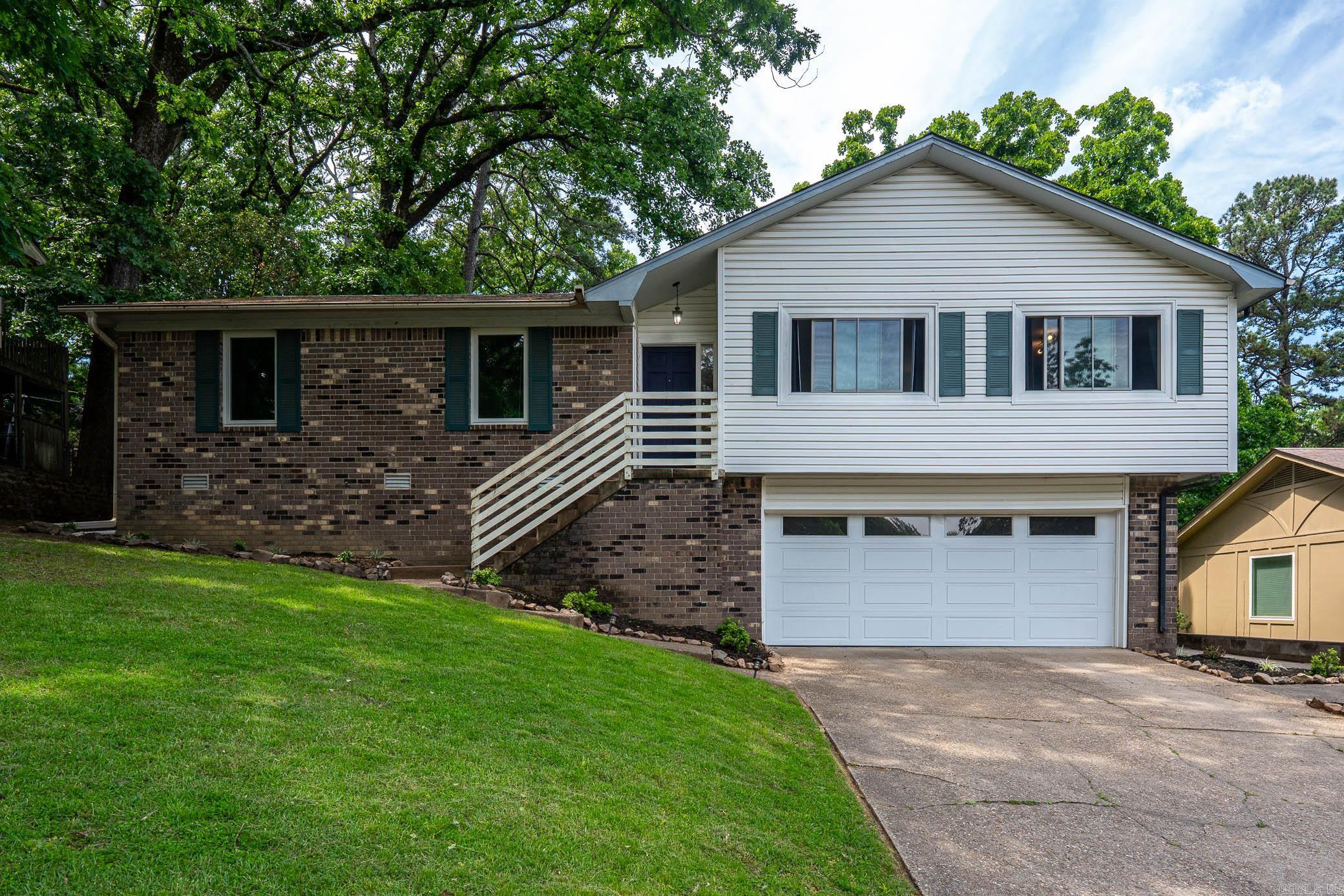 Welcome to 8800 Old Spanish Trail—space, flexibility, and location all in one.  Located in the established Leawood neighborhood of Midtown Little Rock, this 5-bedroom, 3-bath home offers nearly 3,000 sq ft of versatile living. The main level features 4 bedrooms and an open layout where the kitchen flows into the spacious living area, creating a functional space for both everyday living and entertaining. Multiple living areas give you room to spread out and make it your own.  Downstairs, you’ll find a private suite with a bedroom, full bath, and its own living space with fireplace—ideal for guests, multigenerational living, or a private retreat.  Conveniently located near shopping, dining, and everything Midtown and West Little Rock has to offer, this home delivers both comfort and accessibility.  If you’ve been looking for space and flexibility in a prime location, this one is worth a look.