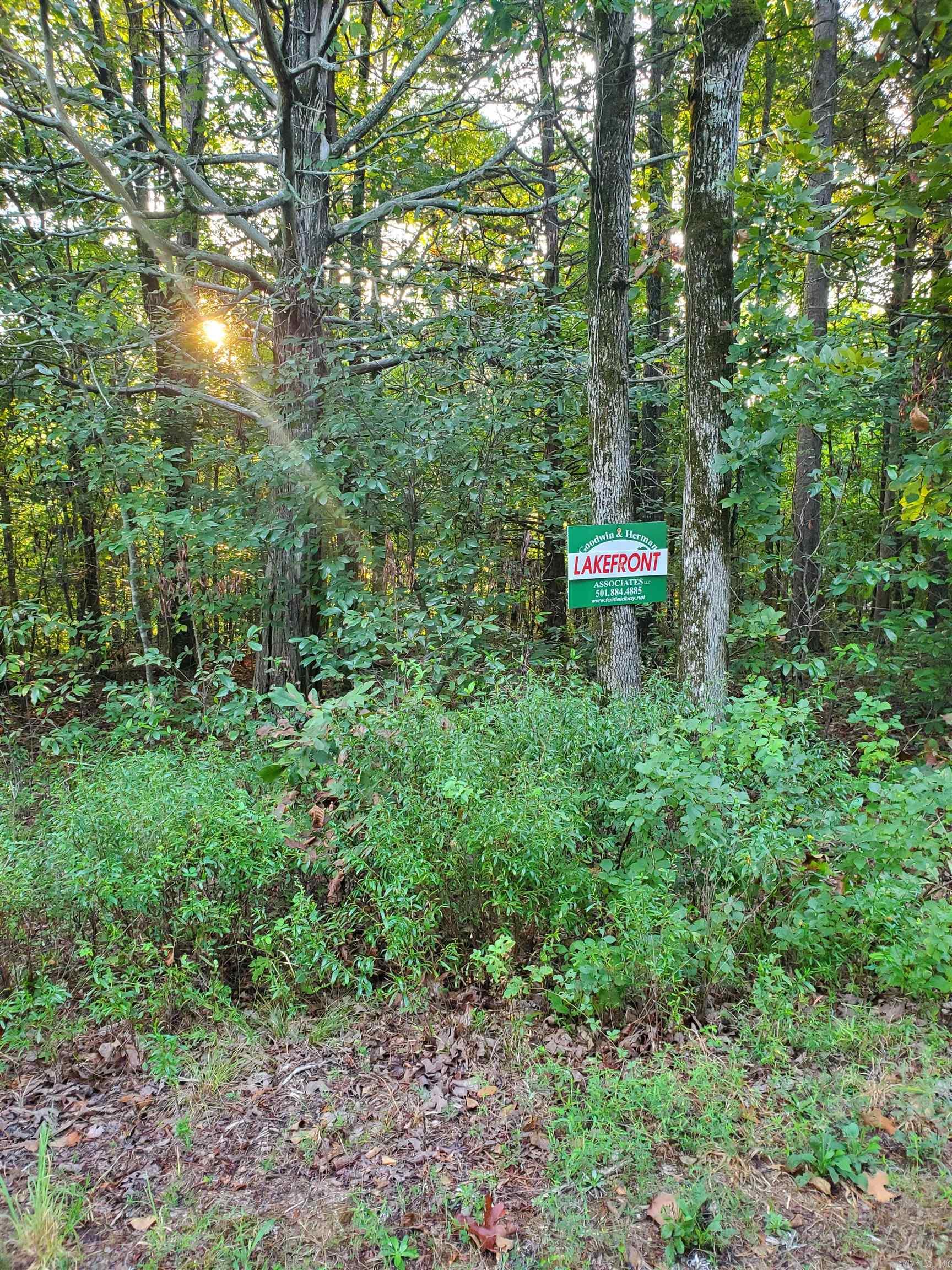 Lakefront in nice lakeside neighborhood close to the marina.  Nicely maintained homes on the street.  Good level spot within the lot for building.  Not many lakefront lots left at this price, so your buyers will want to jump on this.