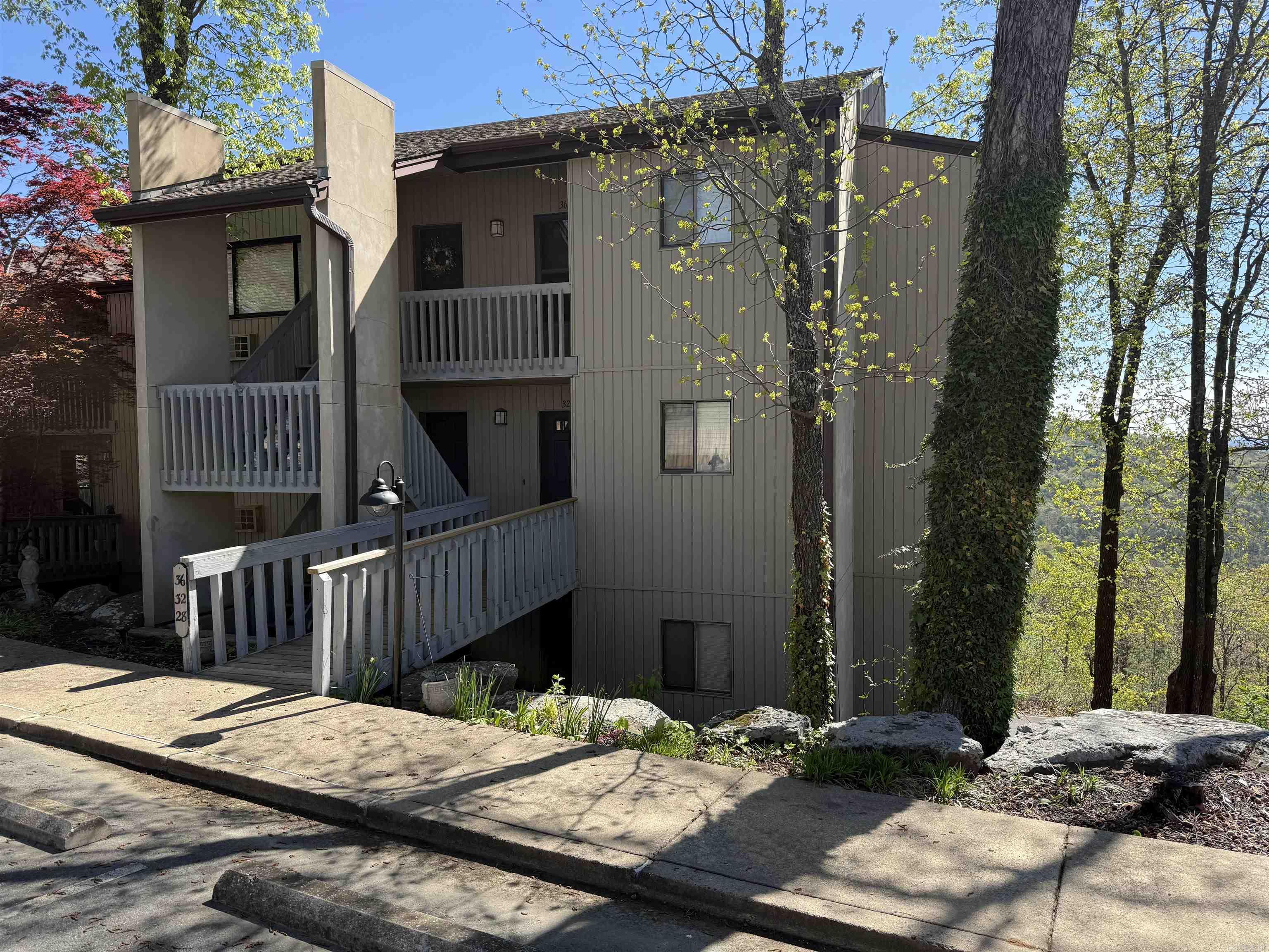 LAKEVIEW Garden level  located in Cliffside condo complex. This condo has a view of Greers Ferry lake and the mountain vista. Beautiful ans clean. Be sure to notice the custom sun-filtering shades that easily adjust!!  Two large bedrooms that will accommodate King beds or 2 Queens, 2 bathrooms.  Enjoy the wrap-around rear deck with a lake view! This condo can be your perfect lake getaway, or to use as a short-term rental property.  Located close to the cool pool, tennis courts, pickleball courts, mini golf, bowling, golf, hiking trails, four-wheeler trails and so much more. Call today for your private tour.  Appointment required due to rental guests. Furniture is included, so it’s ready to go!!.  Agent Remarks