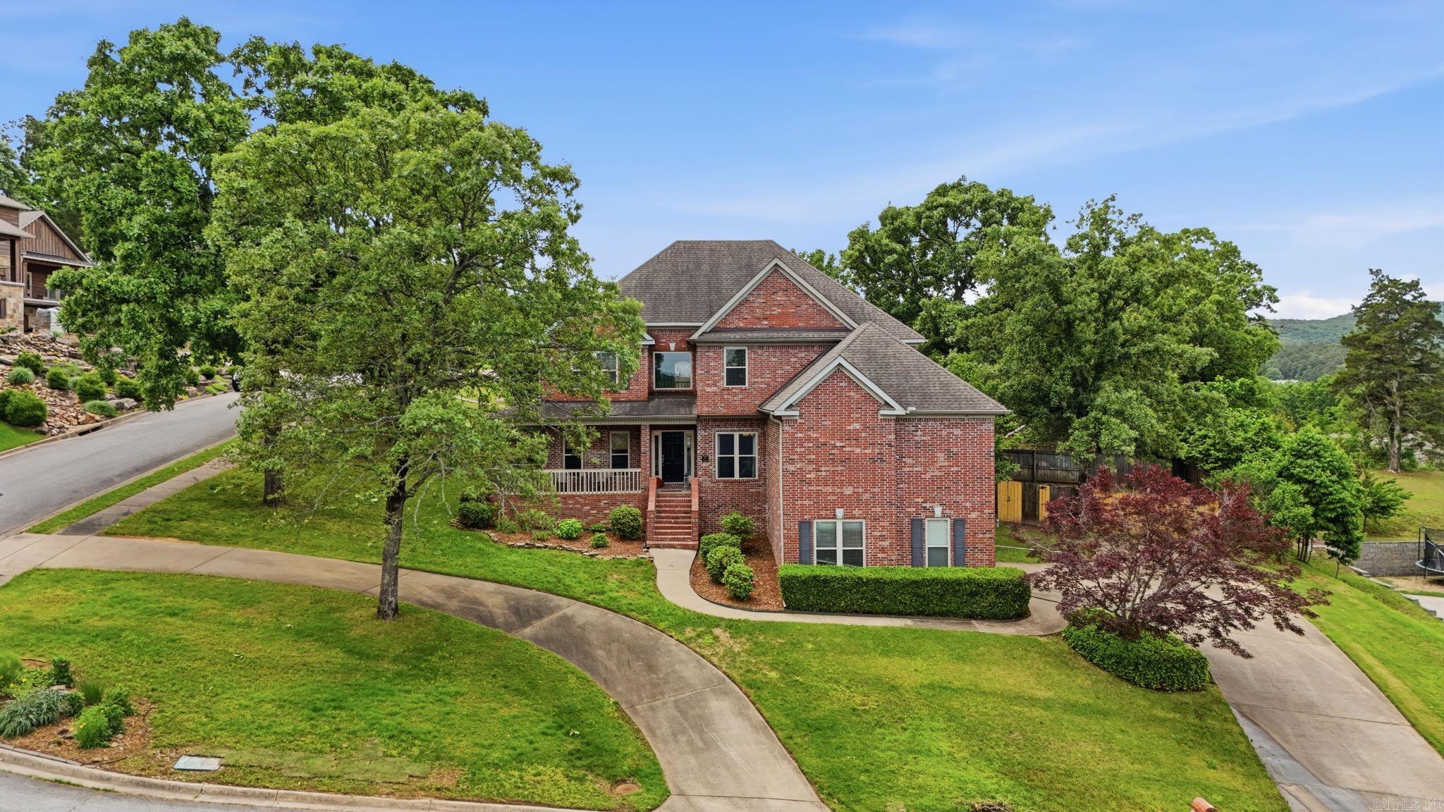 Come see this beautiful family home in the shadow of Pinnacle Mountain.  Nestled in the The Ranch neighborhood, this 5 bedroom 4 bath house has space for everyone!  The large updated kitchen is part of the open floor plan leading into the breakfast area and living room.  A dinning room, office, oversized family room and guest bedroom/bath complete the spacious main level.  Upstairs has the primary suite with walk in closet, soaking tub and shower.  A guest bedroom with full bath and two bedrooms that share a bath are also upstairs.  Fully fenced back yard.  Two car garage.  Corner lot.  Close to schools, shopping and restaurants!  Owner access to The Ranch playground and private lake.