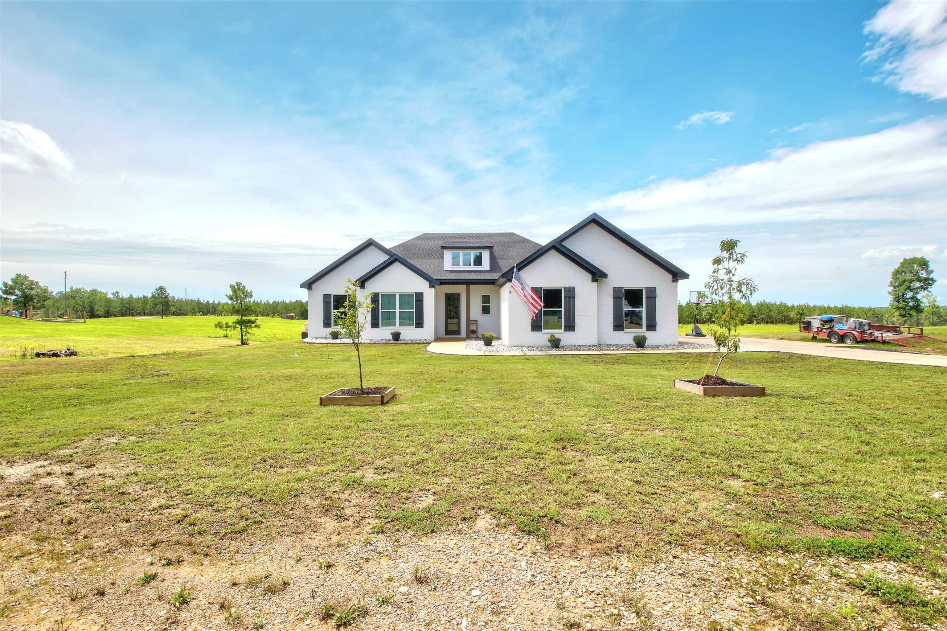 Stunning home built at the end of 2022.  This beauty has endless space and storage, offering tons of custom features and a fantastic view!  With 2150 sq ft, 4 bedrooms w/2 baths, open kitchen with large island for lots of entertaining and seating.  Don't miss out on the rock fireplace, wooden beams in the living room and a huge, spacious pantry. Large primary suite has beams, on suite w/walk in shower and closet.  Great home with tons of extras, Sitting on nearly 2 acres,  including some beautiful wildlife to watch from the comforts of your own home. Schedule your clients tour NOW, Don't miss out on this one!!